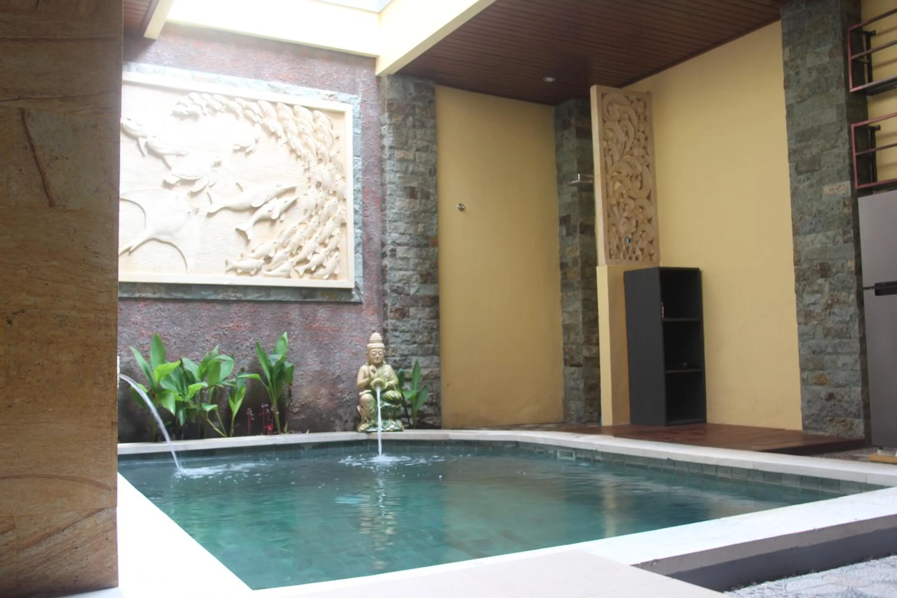 Swimming pool in The Garuda Homestay Sanur