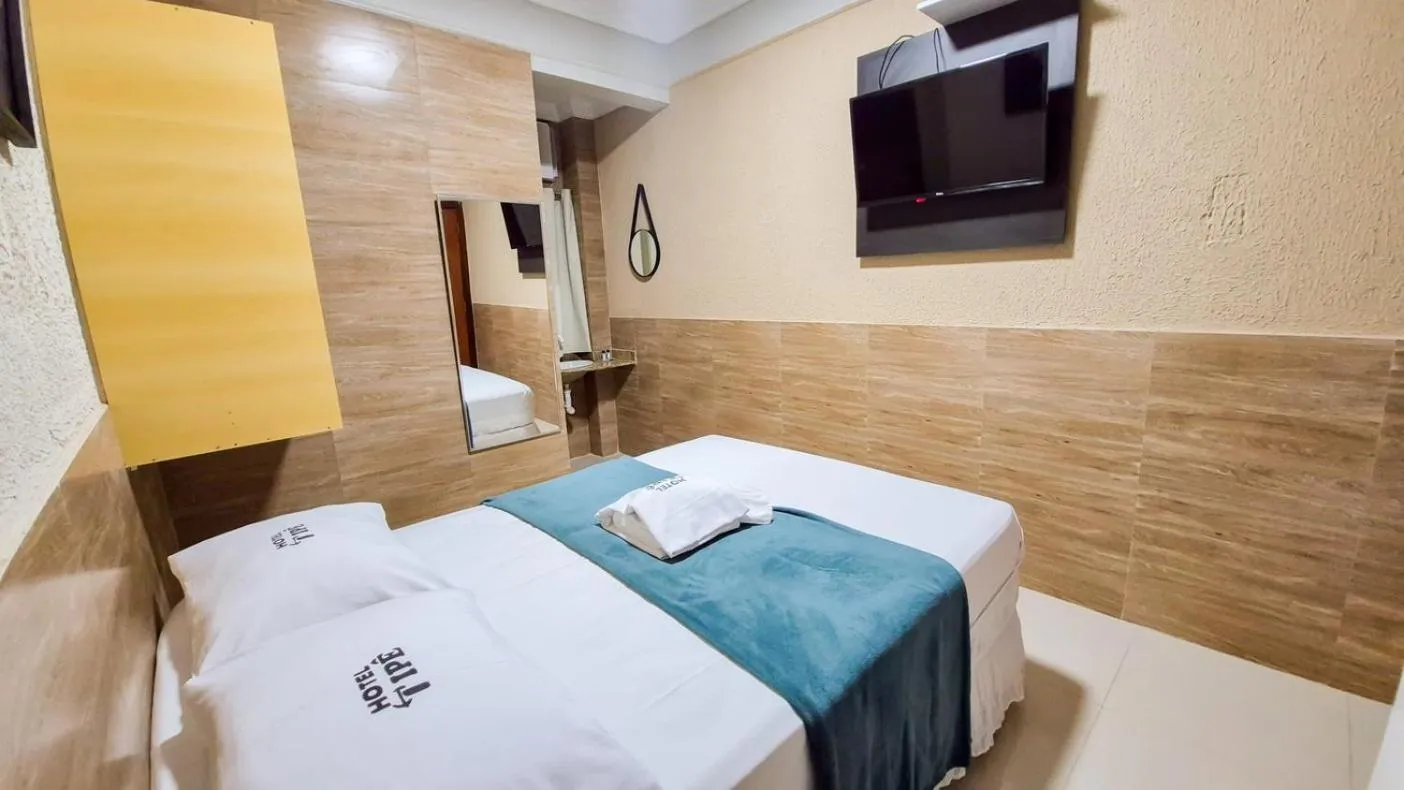 Bed in Hotel Ipê