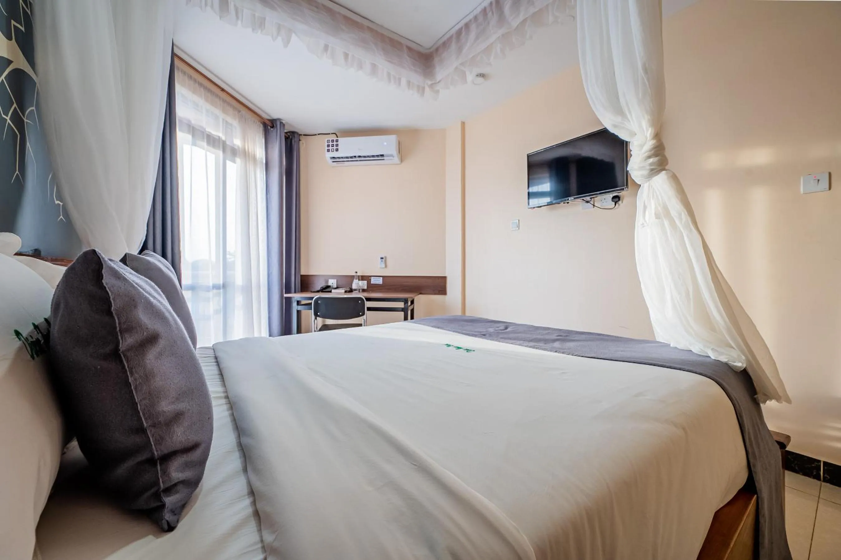 Bed in Divine Homes Resort Kisumu