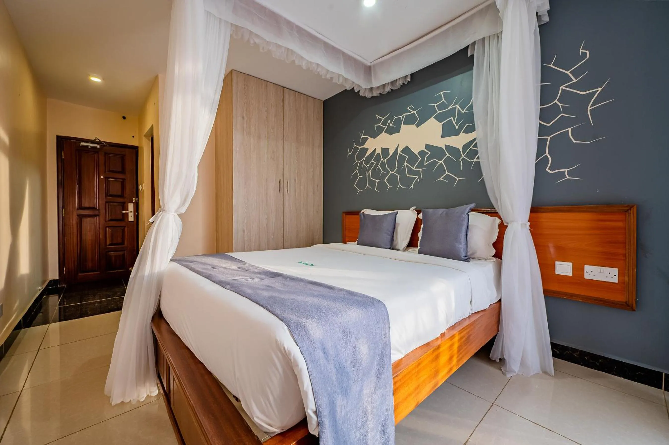 Bed in Divine Homes Resort Kisumu