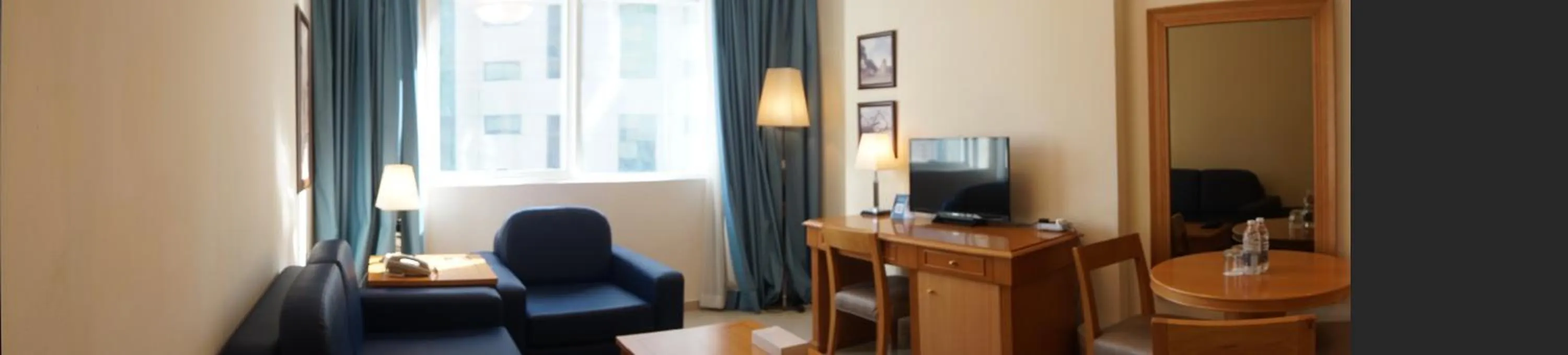 Living room in Golden Tulip Sharjah