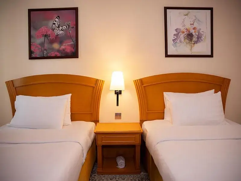 Deluxe Twin Room in Golden Tulip Sharjah Deluxe Twin Room in Golden Tulip Sharjah
