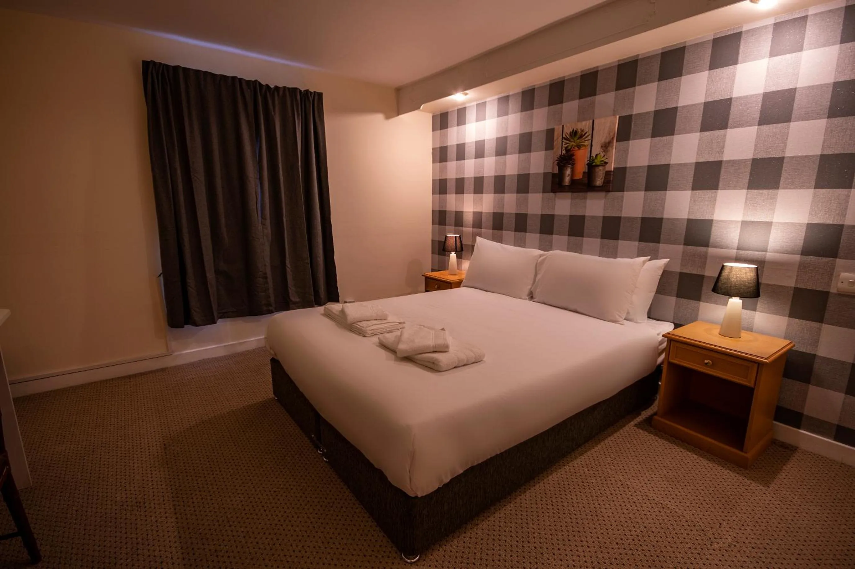 Bed in Douglas Arms Hotel