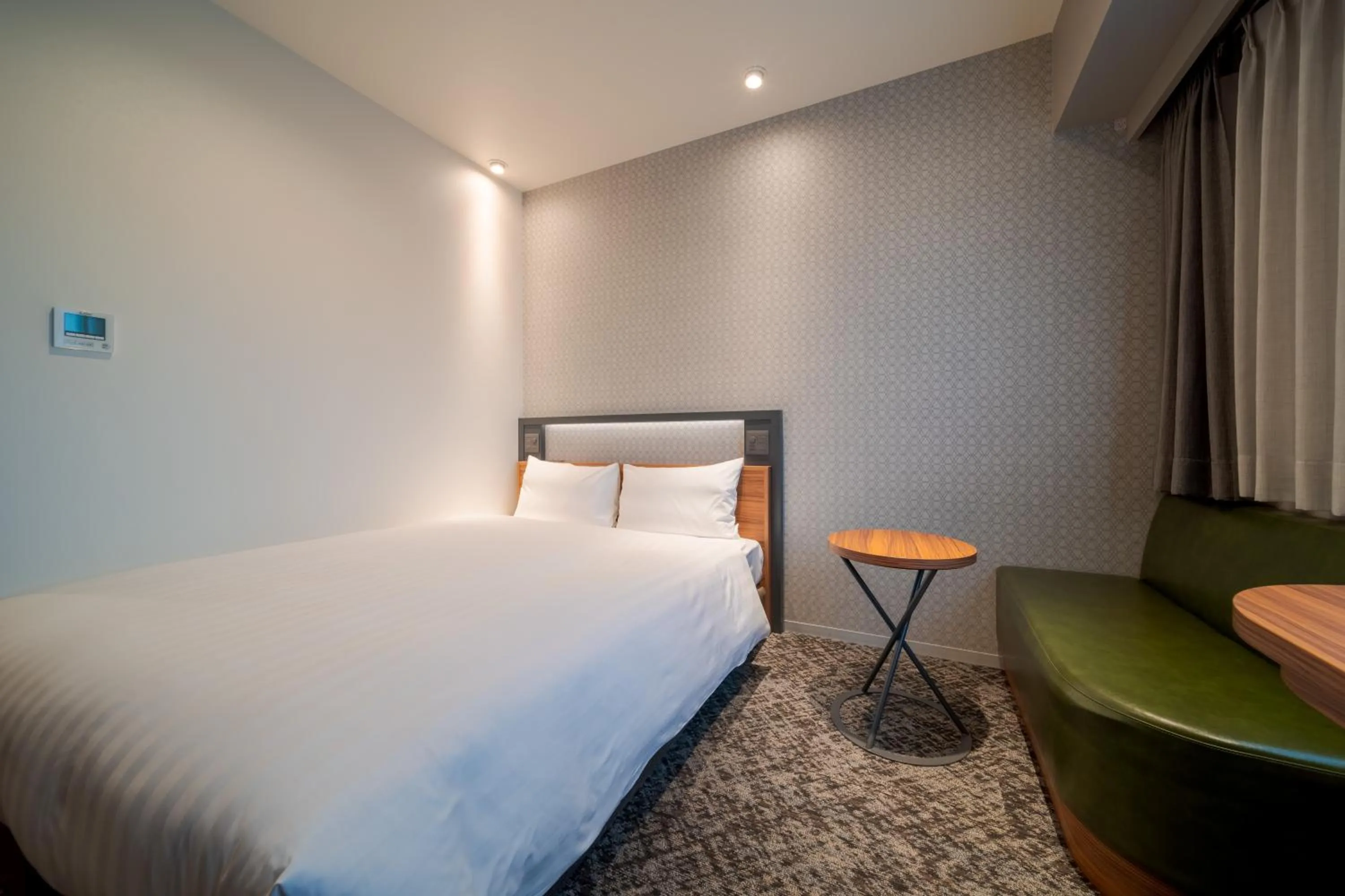 Bed in Via Inn Prime Osaka Kyobashi