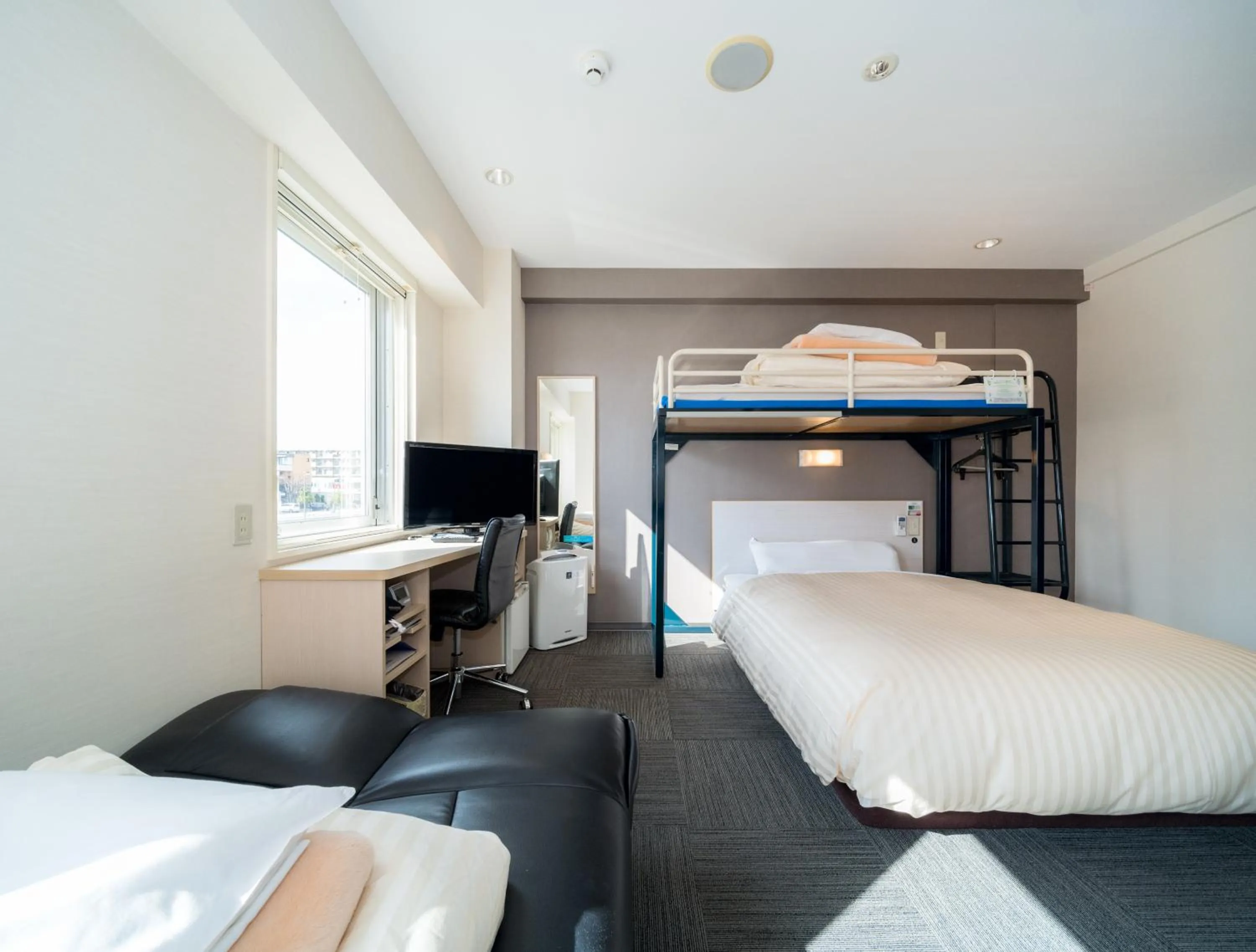 Bed in Super Hotel Yamagataeki Nishiguchi Hot Spring