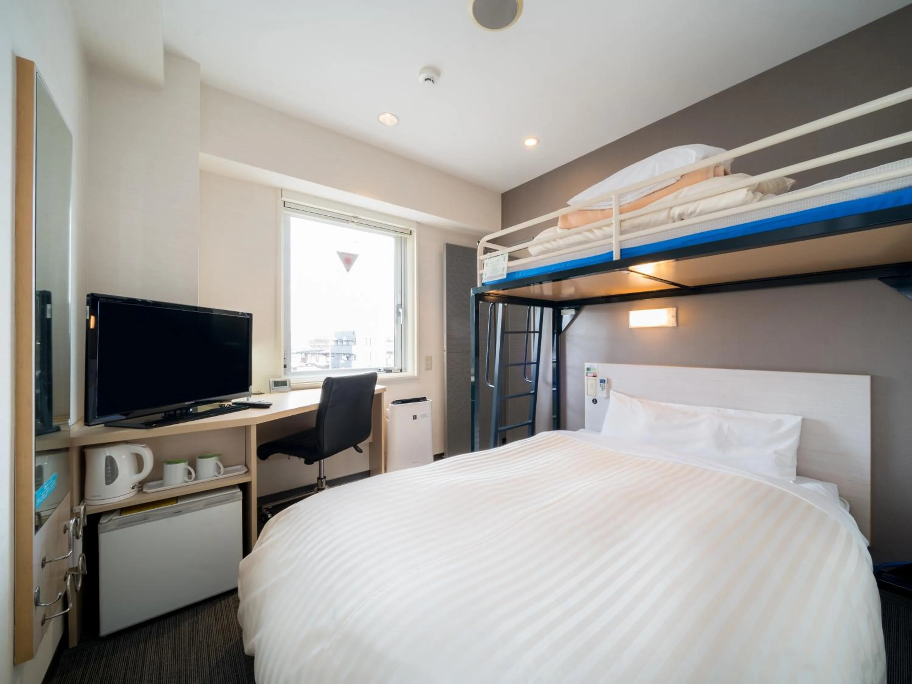 Bed in Super Hotel Yamagataeki Nishiguchi Hot Spring