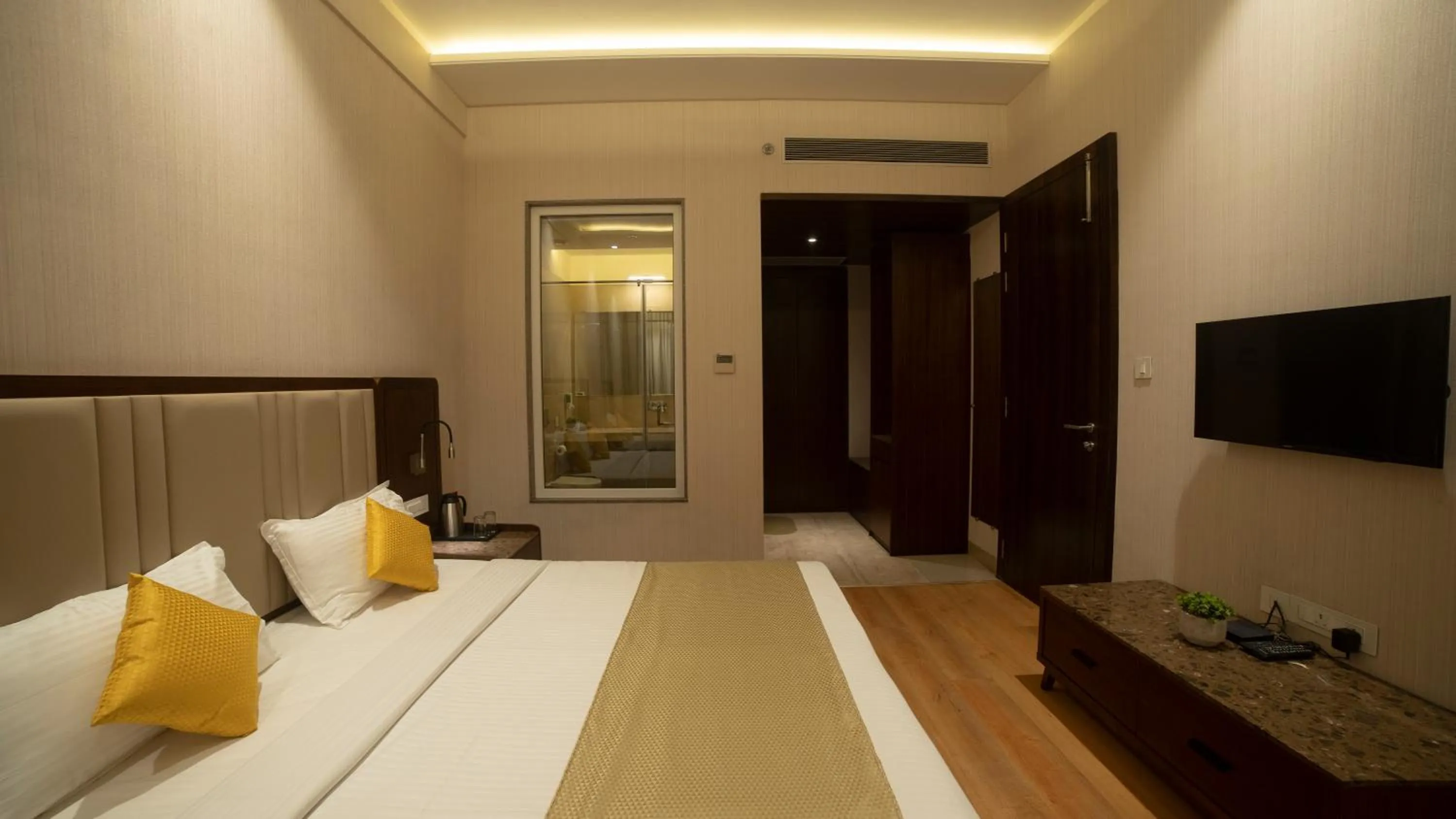 Bed in HOTEL RAJHANS ABHINANDAN