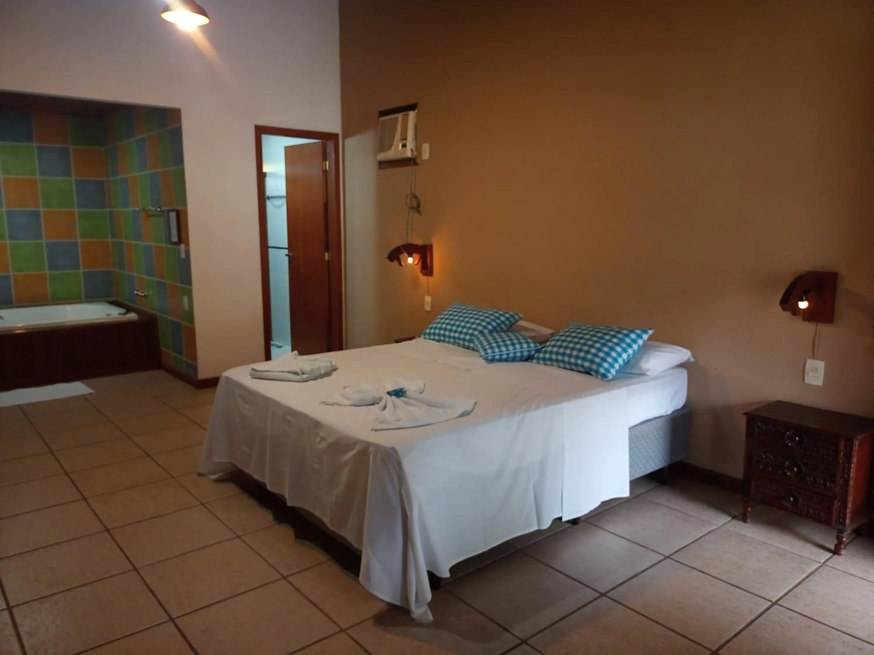 Bed in Pousada Nova Conquista