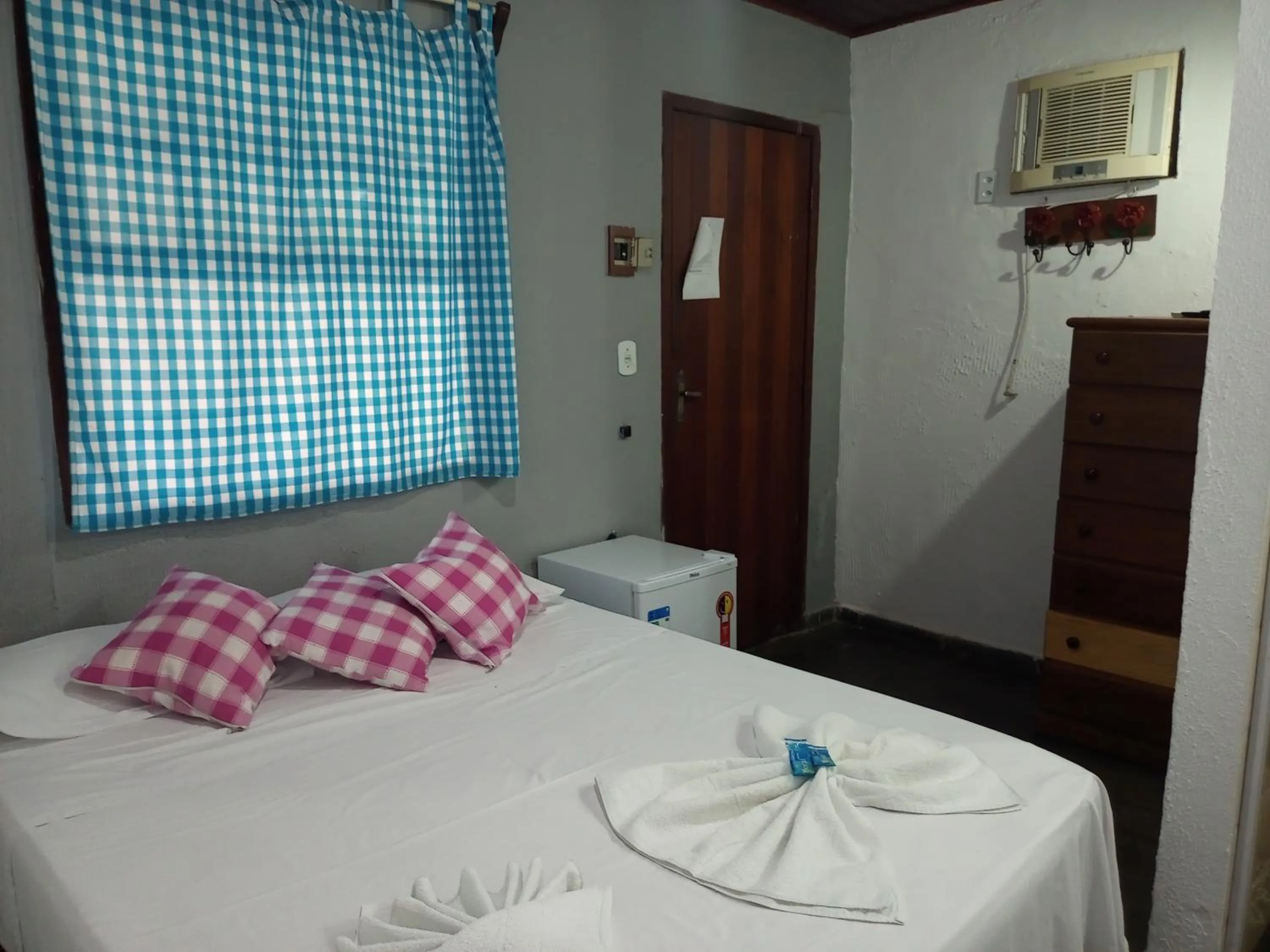 Bed in Pousada Nova Conquista