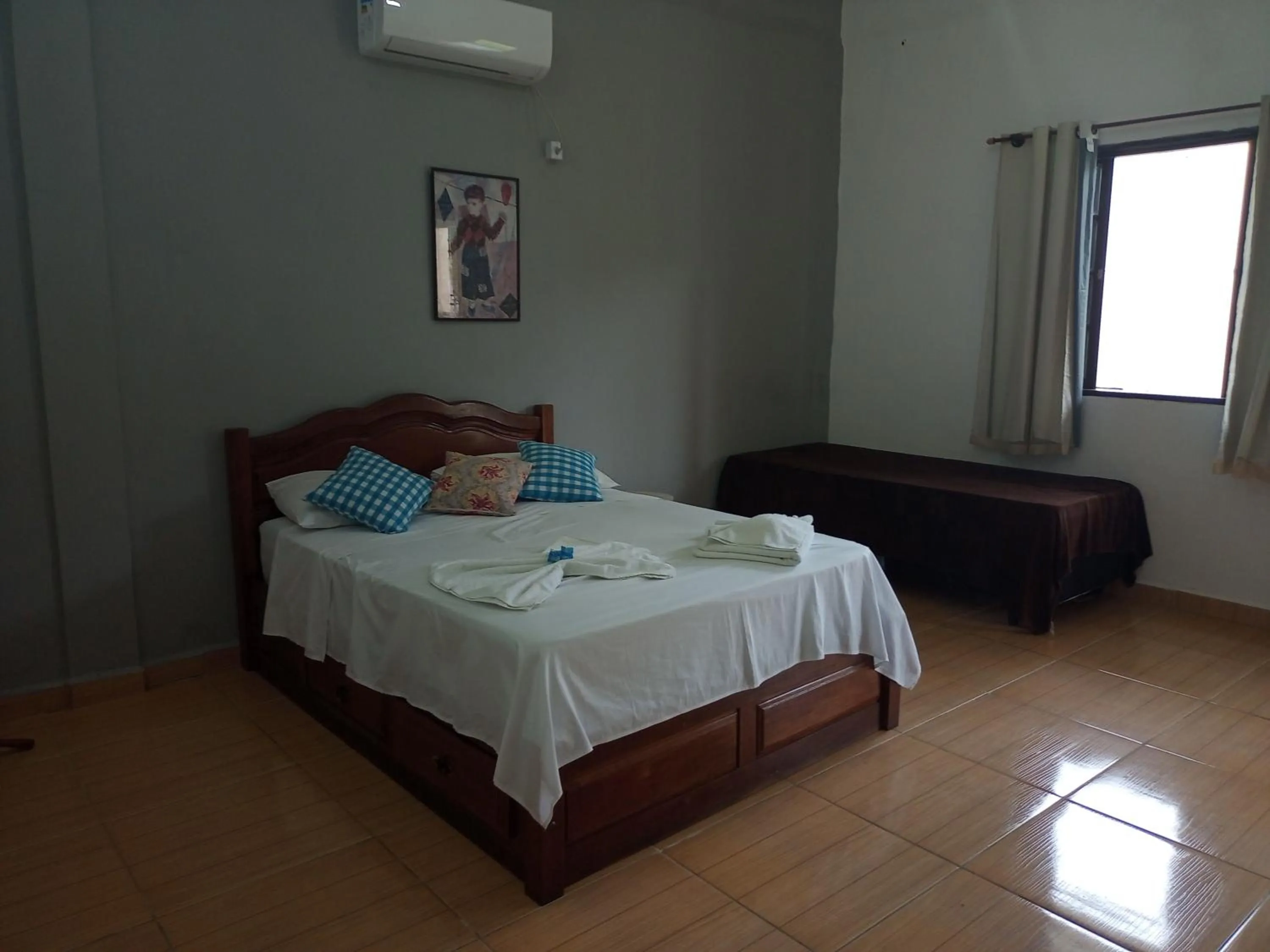 Bed in Pousada Nova Conquista