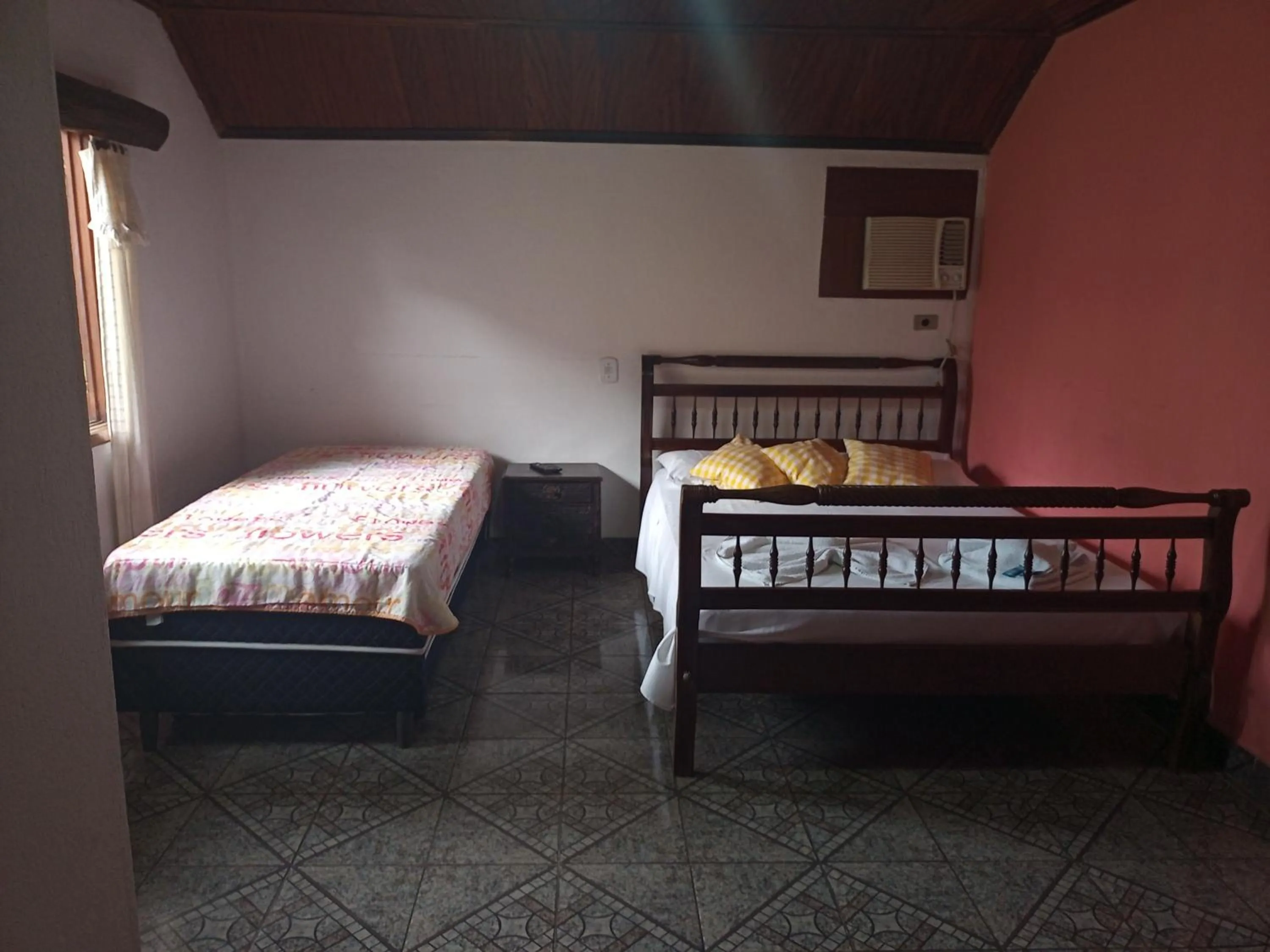 Bed in Pousada Nova Conquista