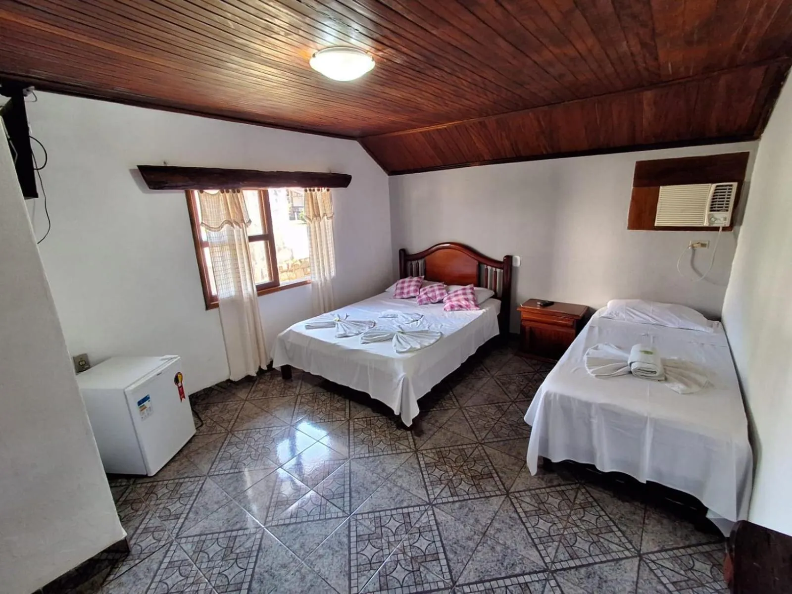 Bed in Pousada Nova Conquista