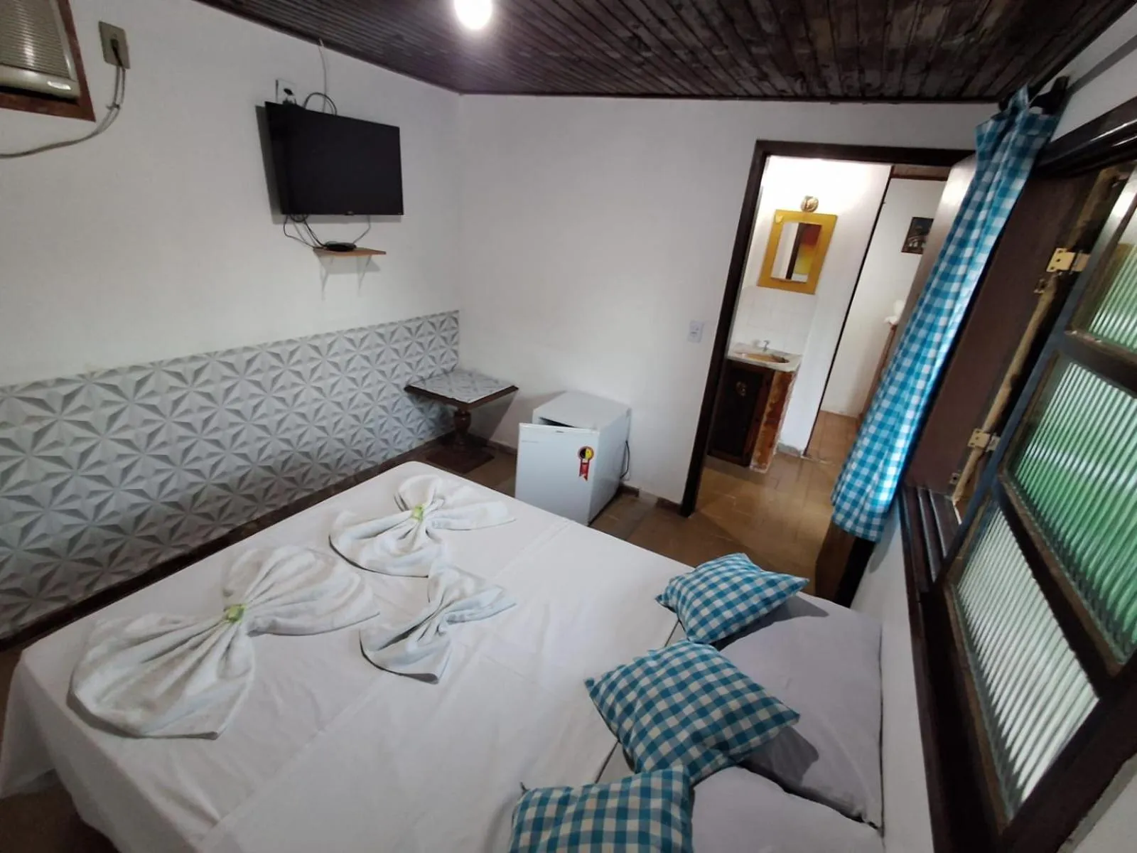 Bed in Pousada Nova Conquista