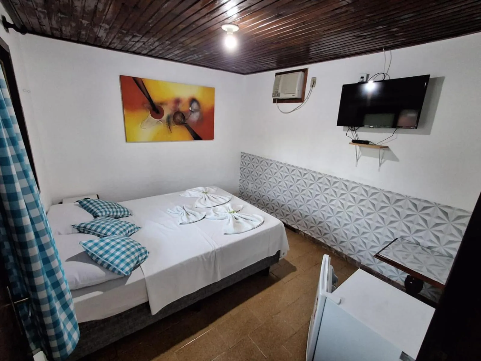 Bed in Pousada Nova Conquista