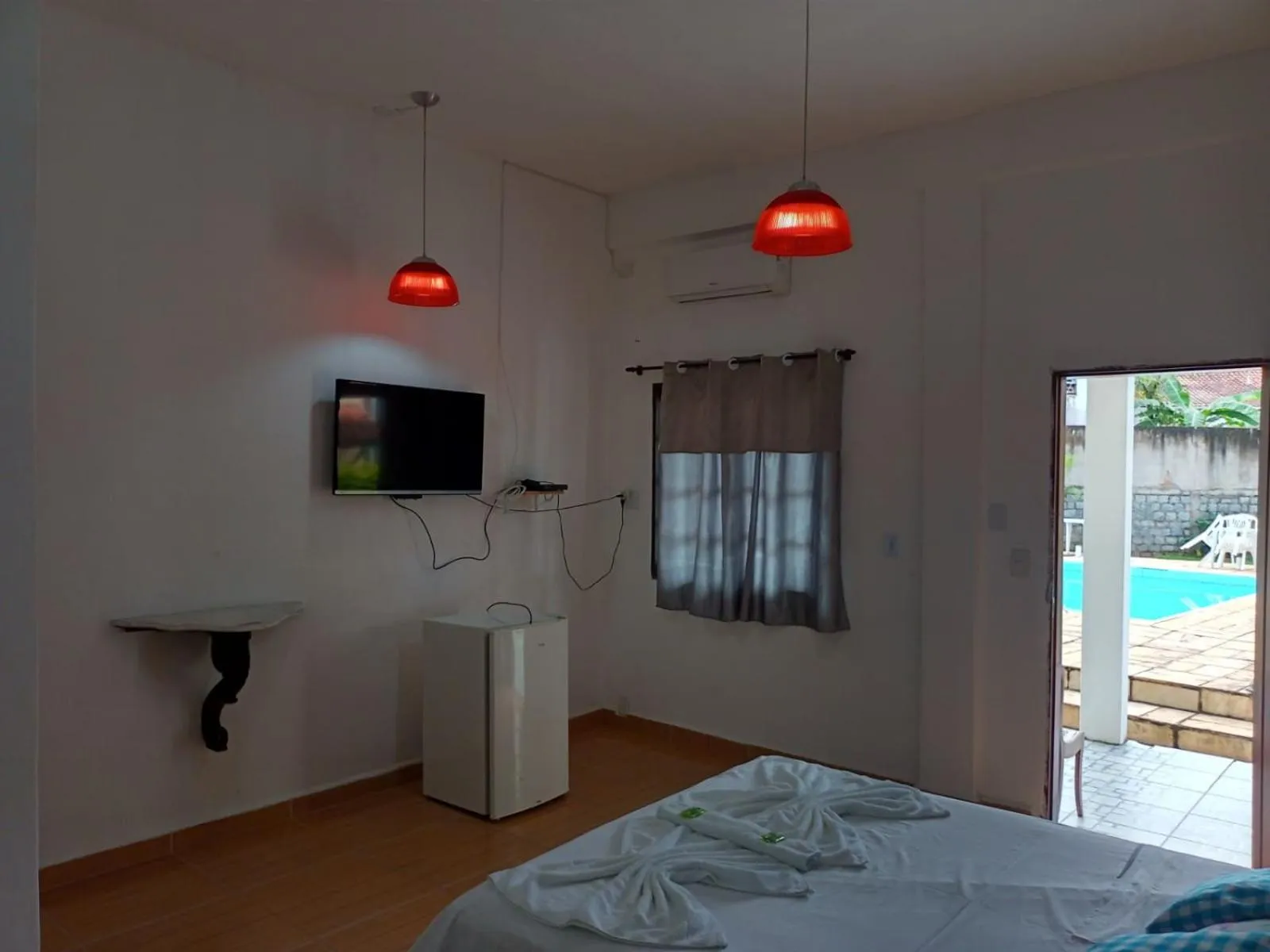 Bed in Pousada Nova Conquista