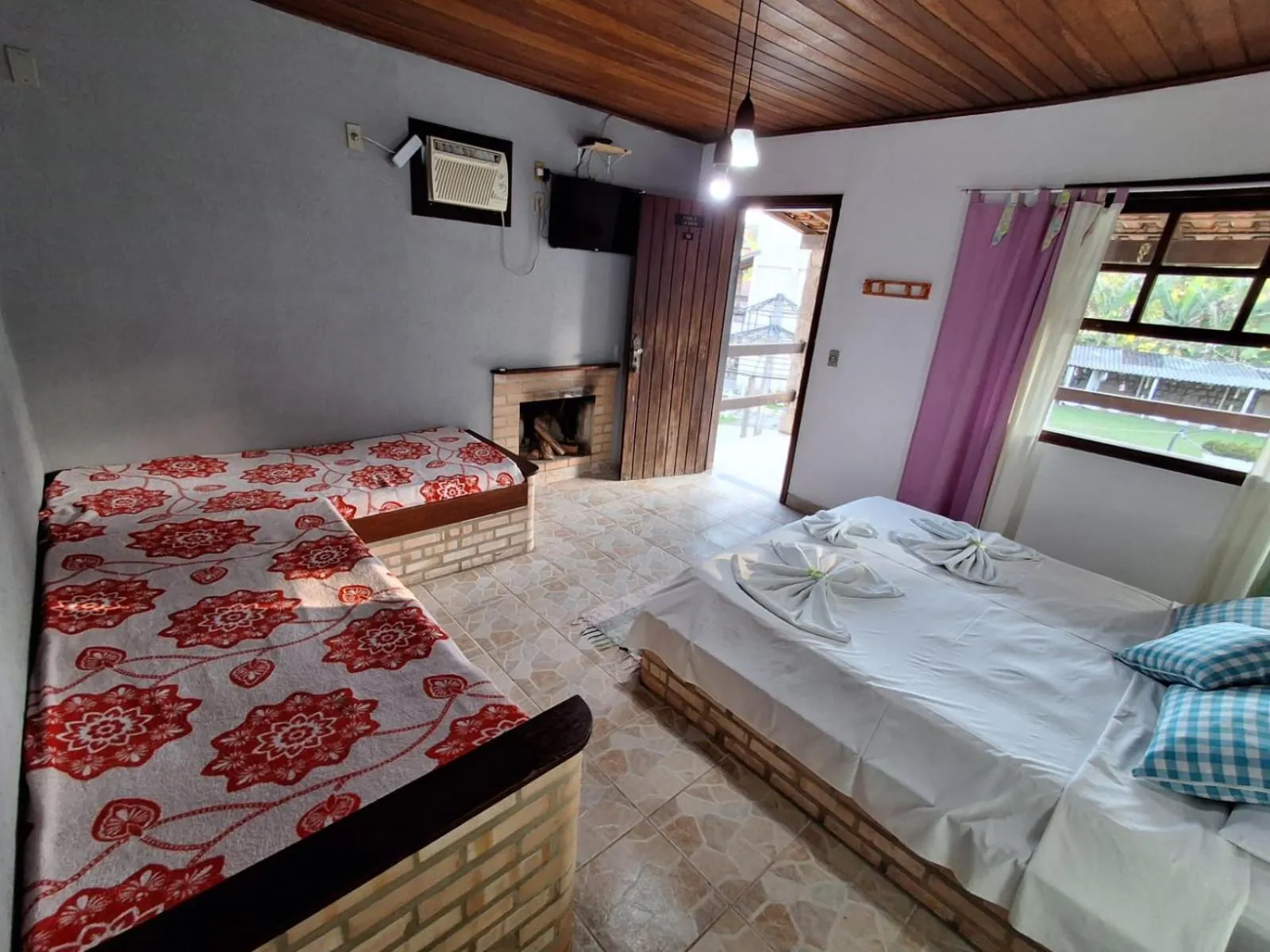 Bed in Pousada Nova Conquista