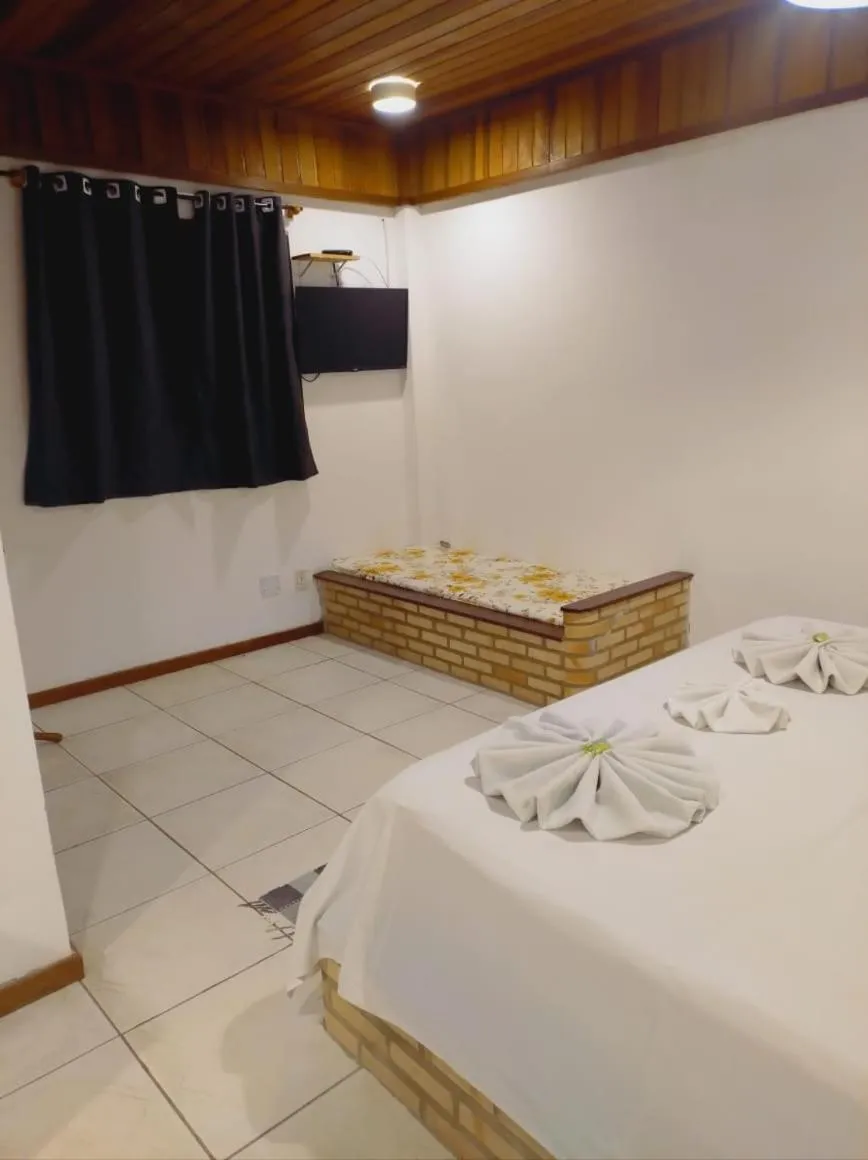 Bed in Pousada Nova Conquista