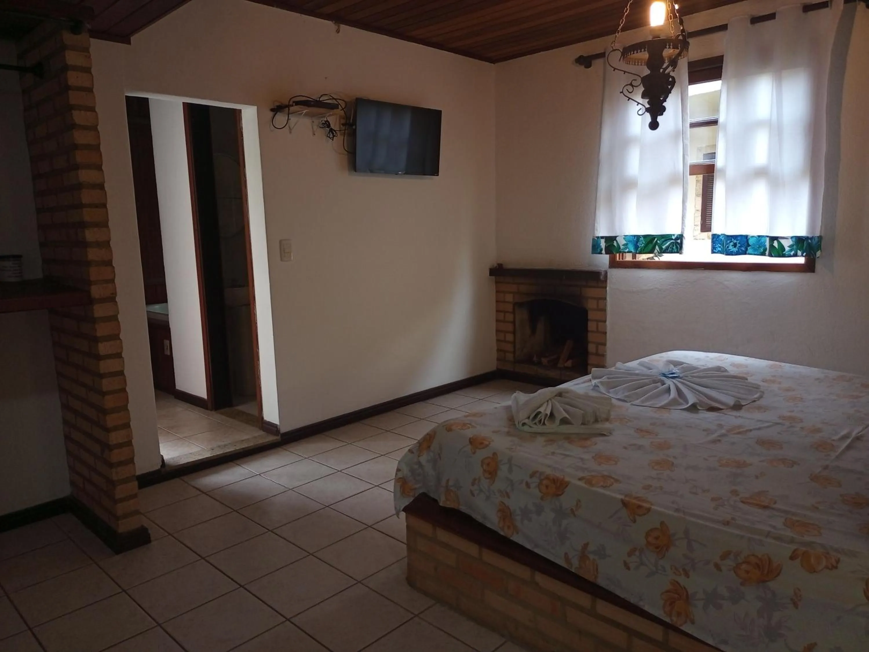 Bed in Pousada Nova Conquista