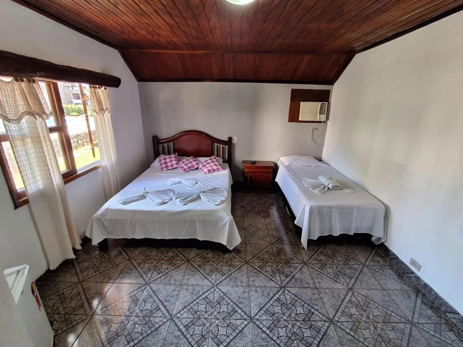 Bed in Pousada Nova Conquista