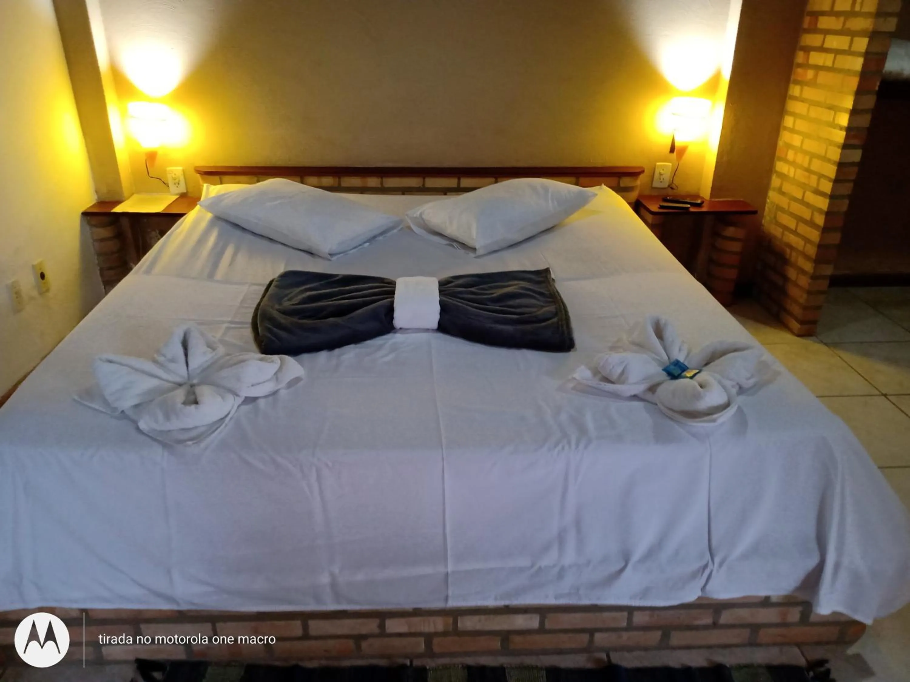 Bed in Pousada Nova Conquista