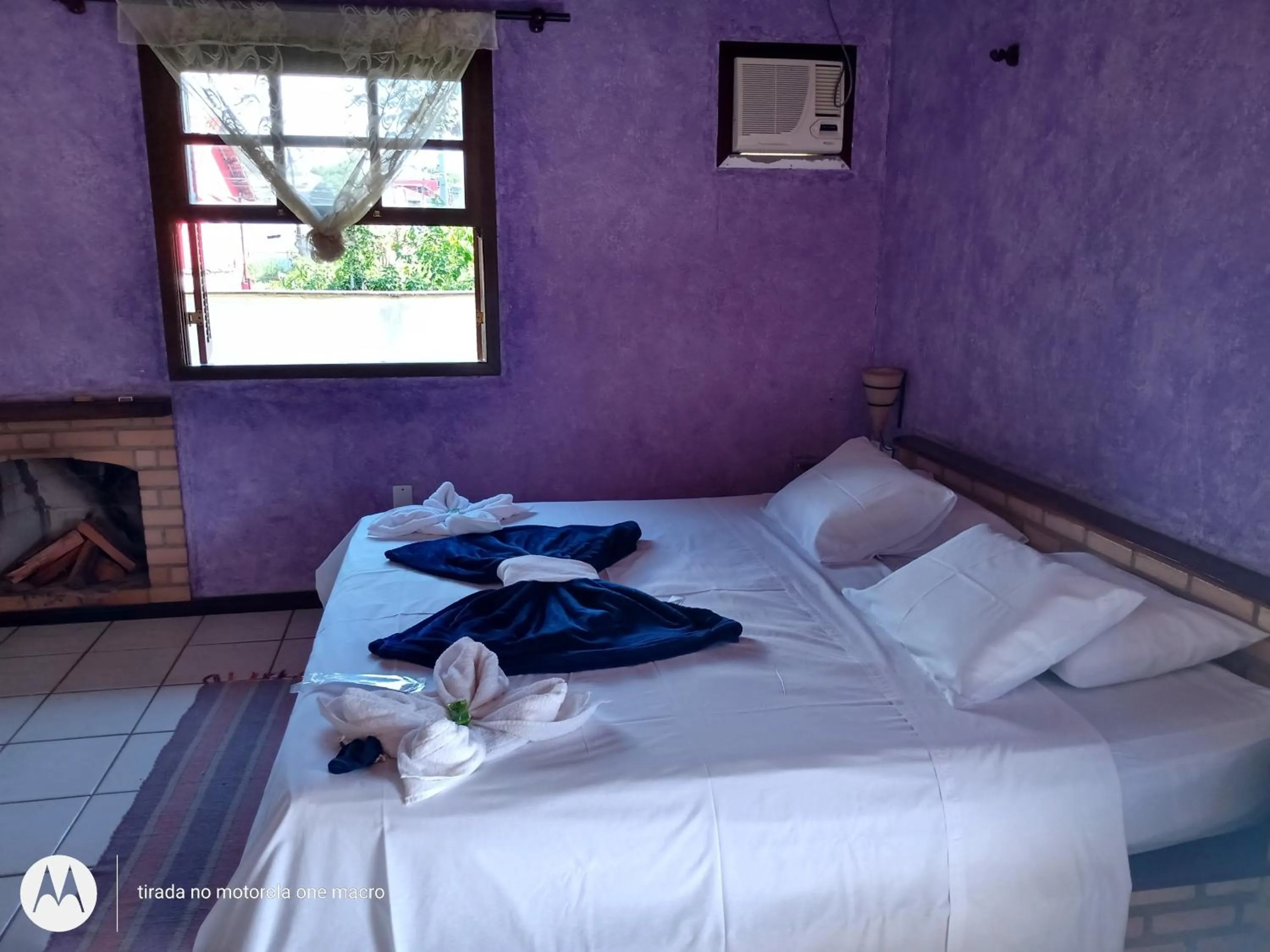 Bed in Pousada Nova Conquista