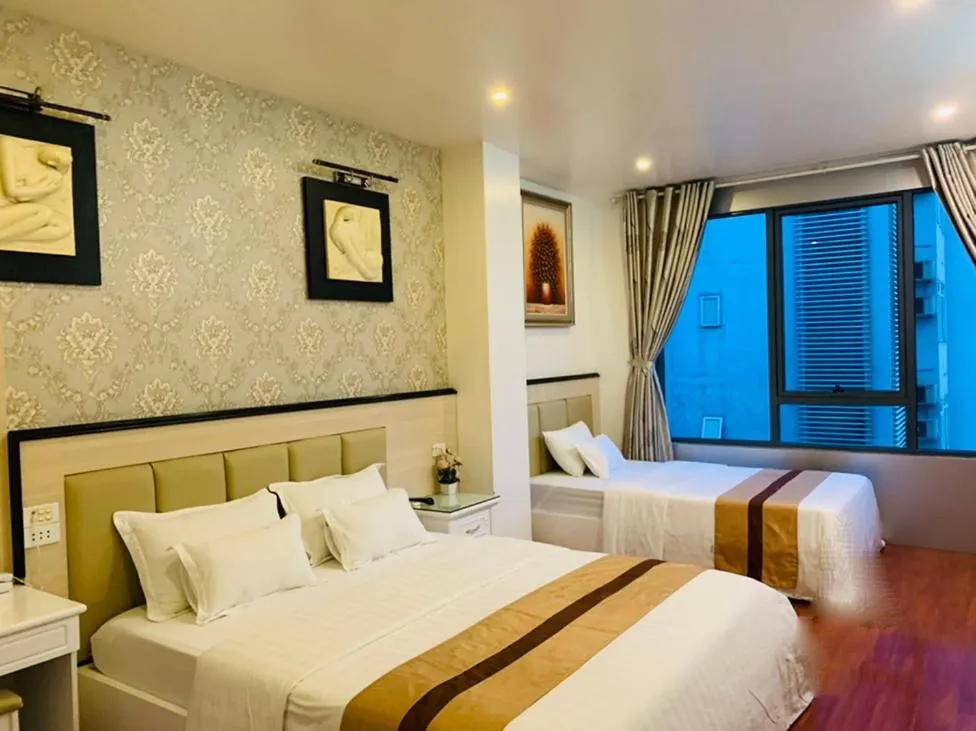 Toilet, Bed in Hotel Nhất Ly