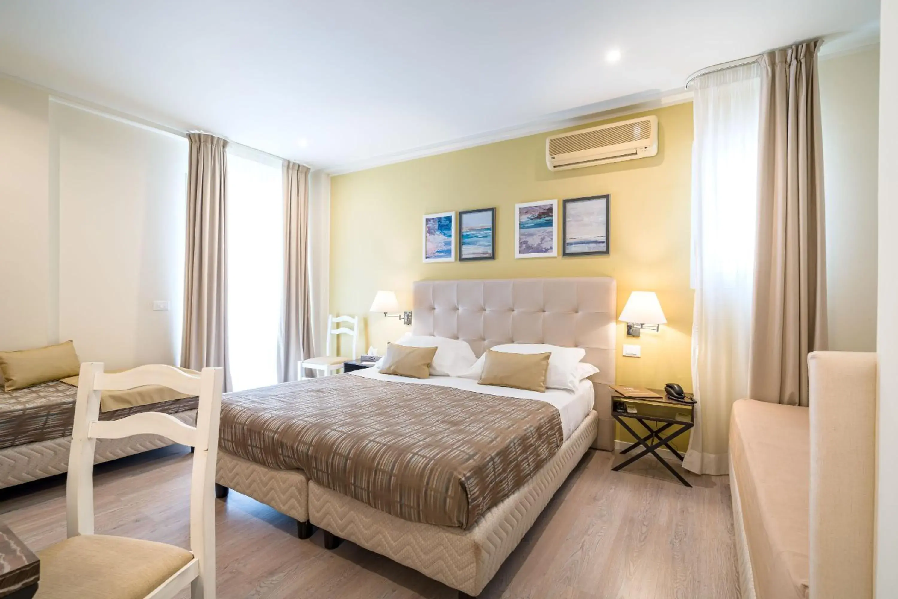 Quadruple Room with Balcony and Side Sea View - single occupancy in Hotel Rivage Taormina Quadruple Room with Balcony and Side Sea View - single occupancy in Hotel Rivage Taormina