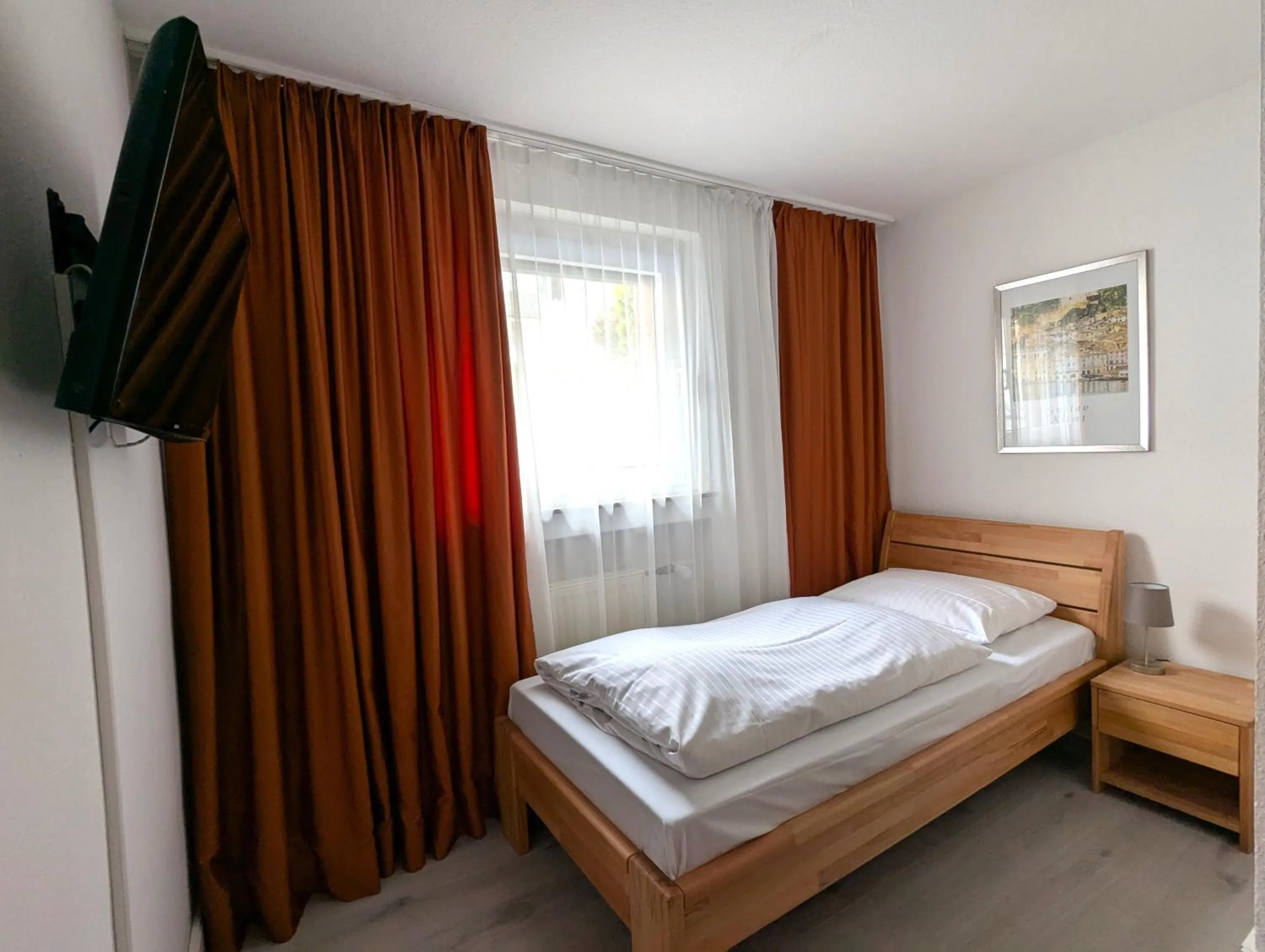 Photo of the whole room, Bed in City Hotel Stuttgart