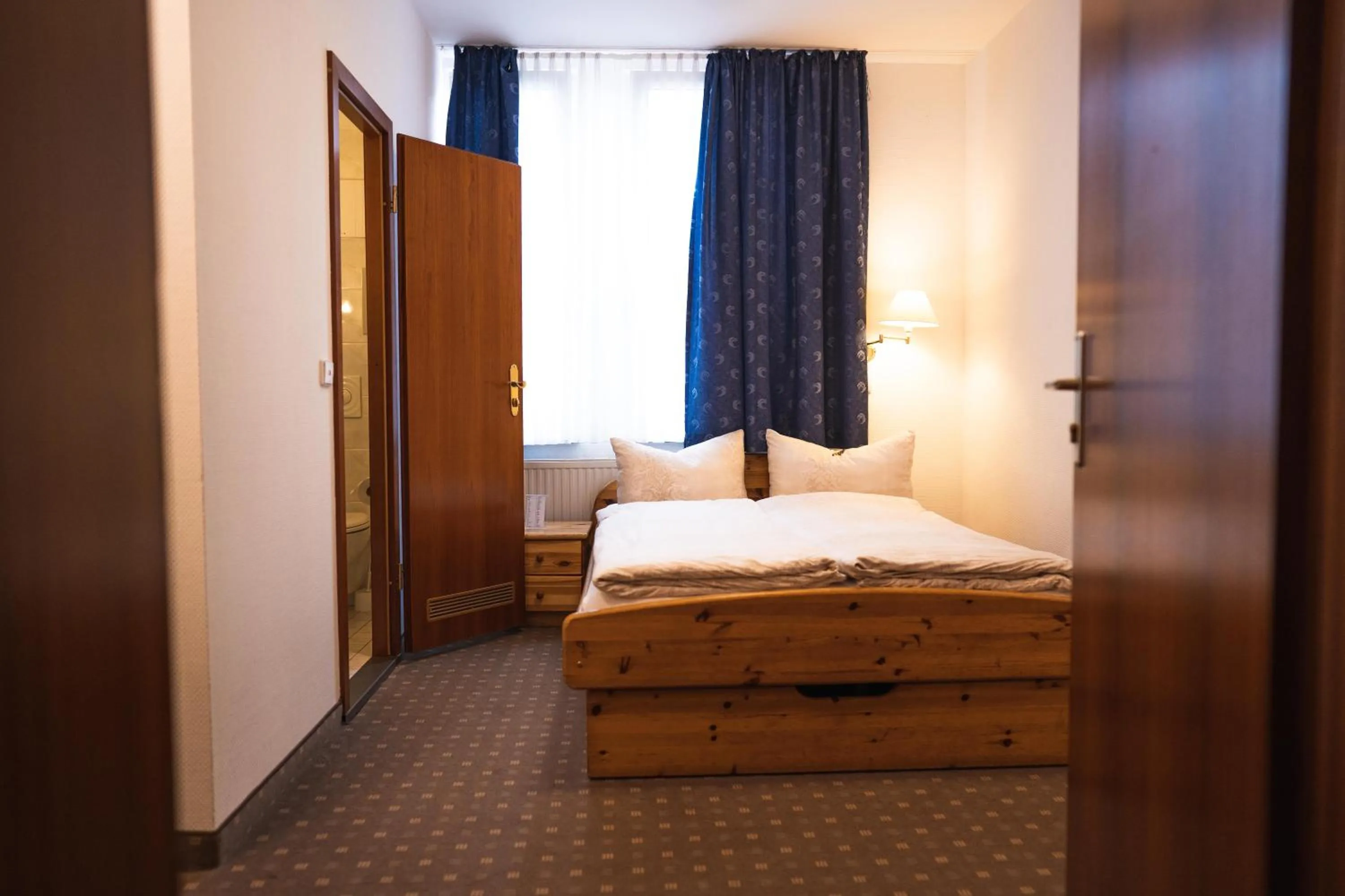 Photo of the whole room, Bed in Pension am Heusteig