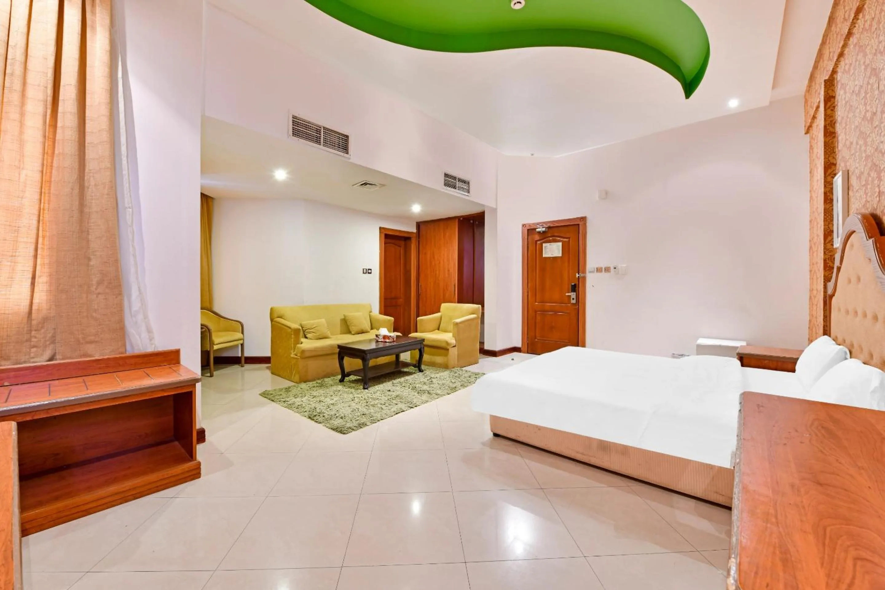 Bedroom, Bed in OYO 118 Revira Hotel