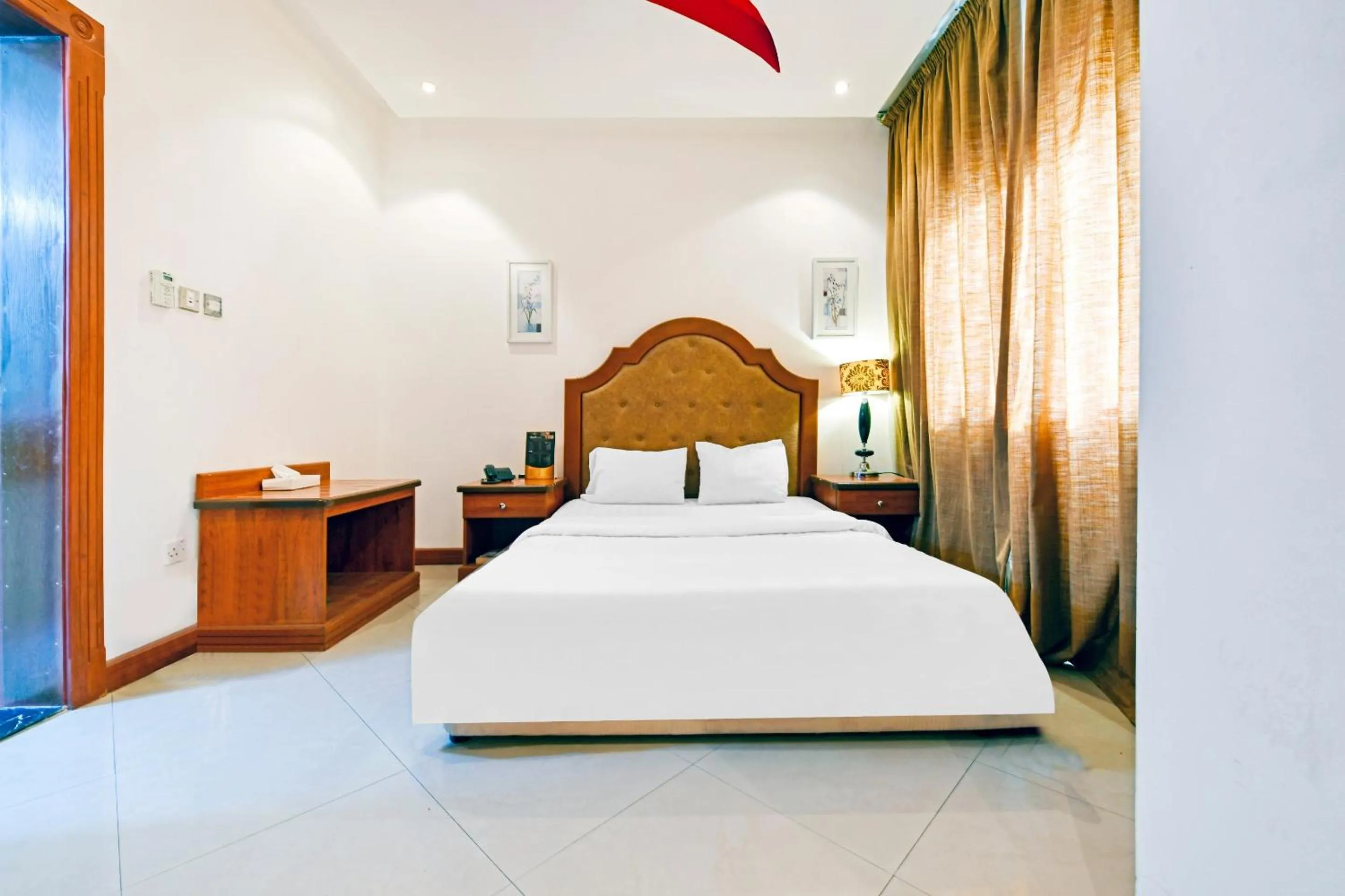 Bedroom, Bed in OYO 118 Revira Hotel