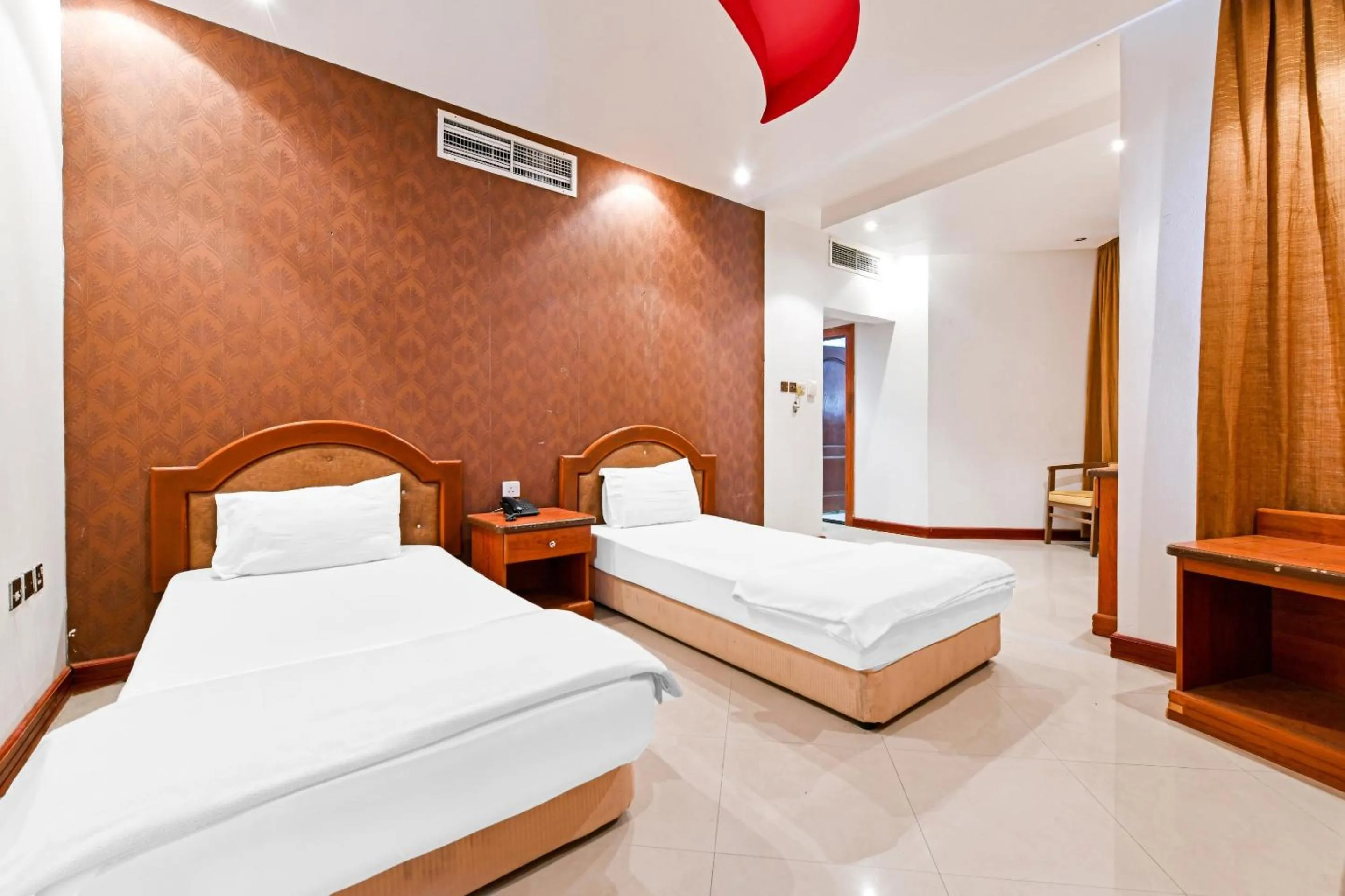 Bedroom, Bed in OYO 118 Revira Hotel