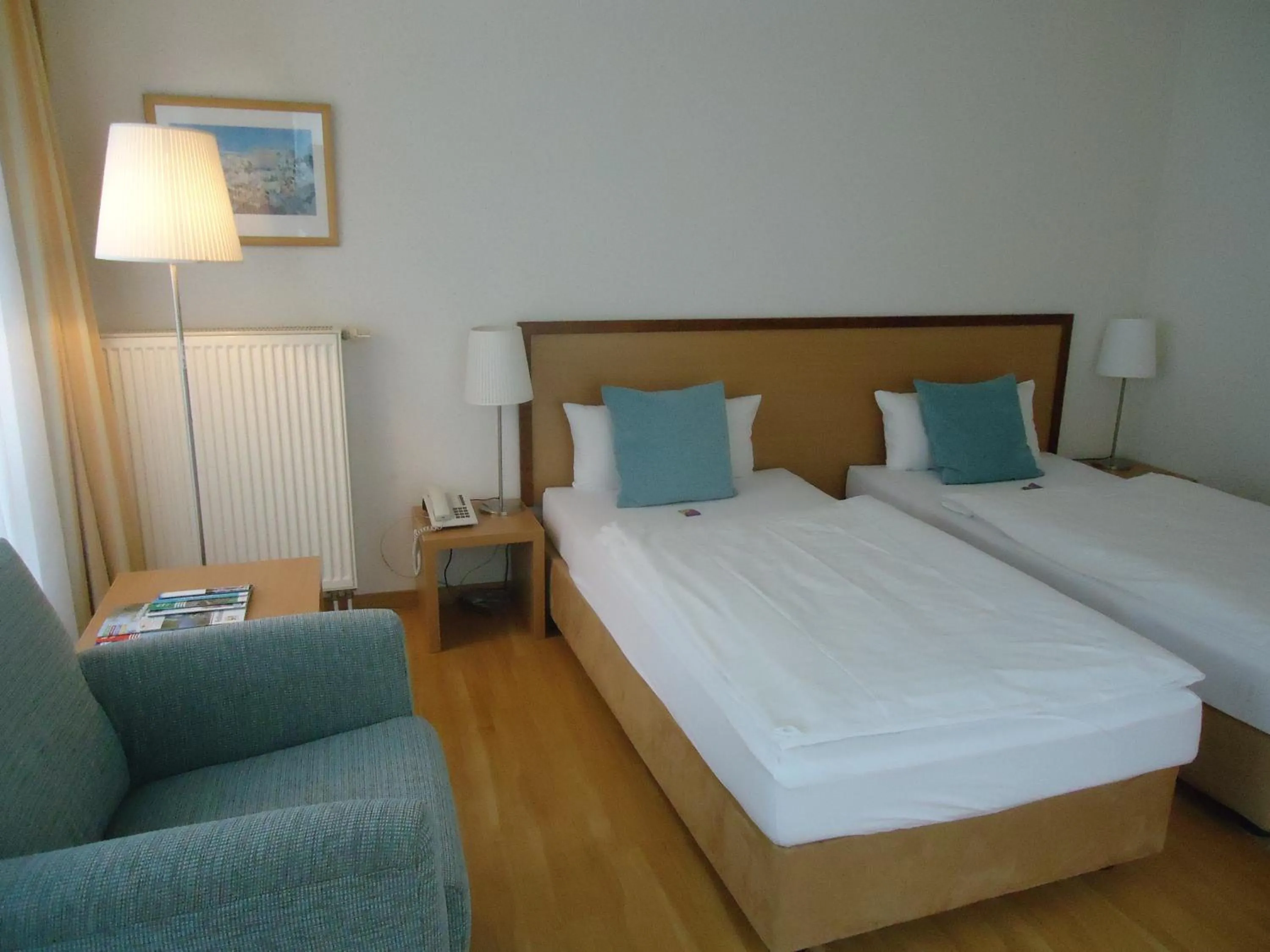 Photo of the whole room, Bed in Thiesmann´s Hotel & Restaurant