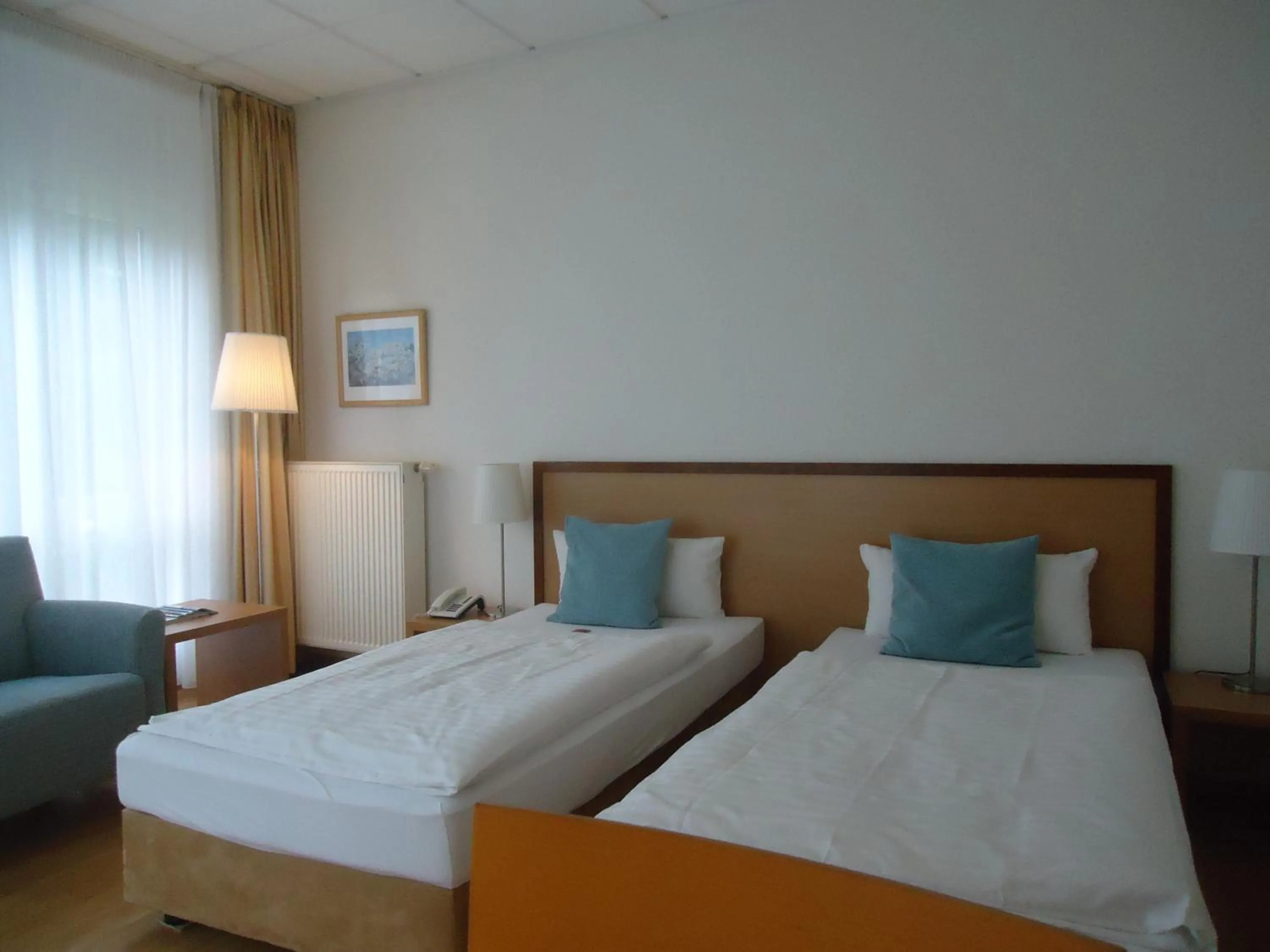 Photo of the whole room, Bed in Thiesmann´s Hotel & Restaurant