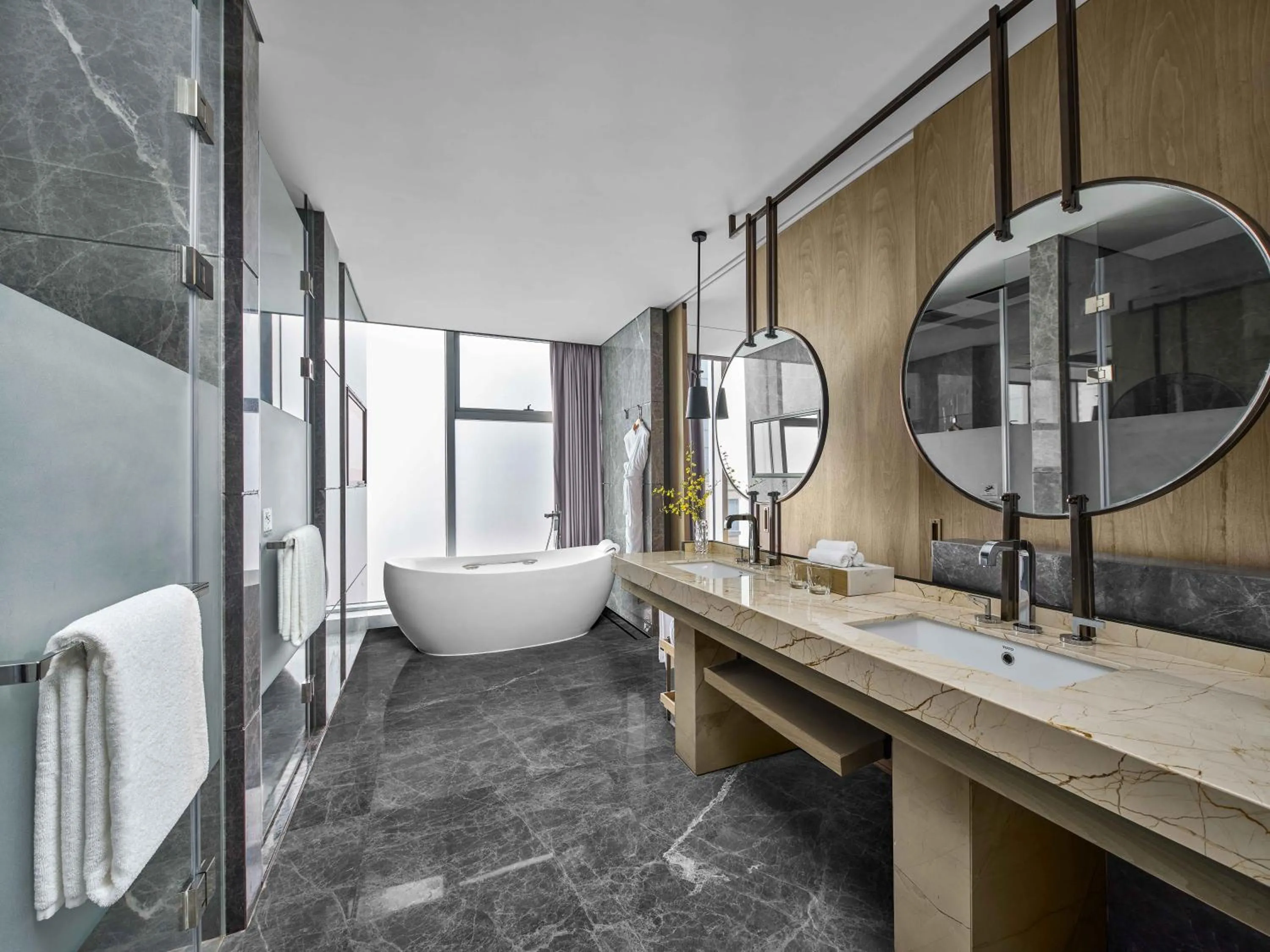 Shower in Vignette Collection Hangzhou Huaxia Center Hotel by IHG