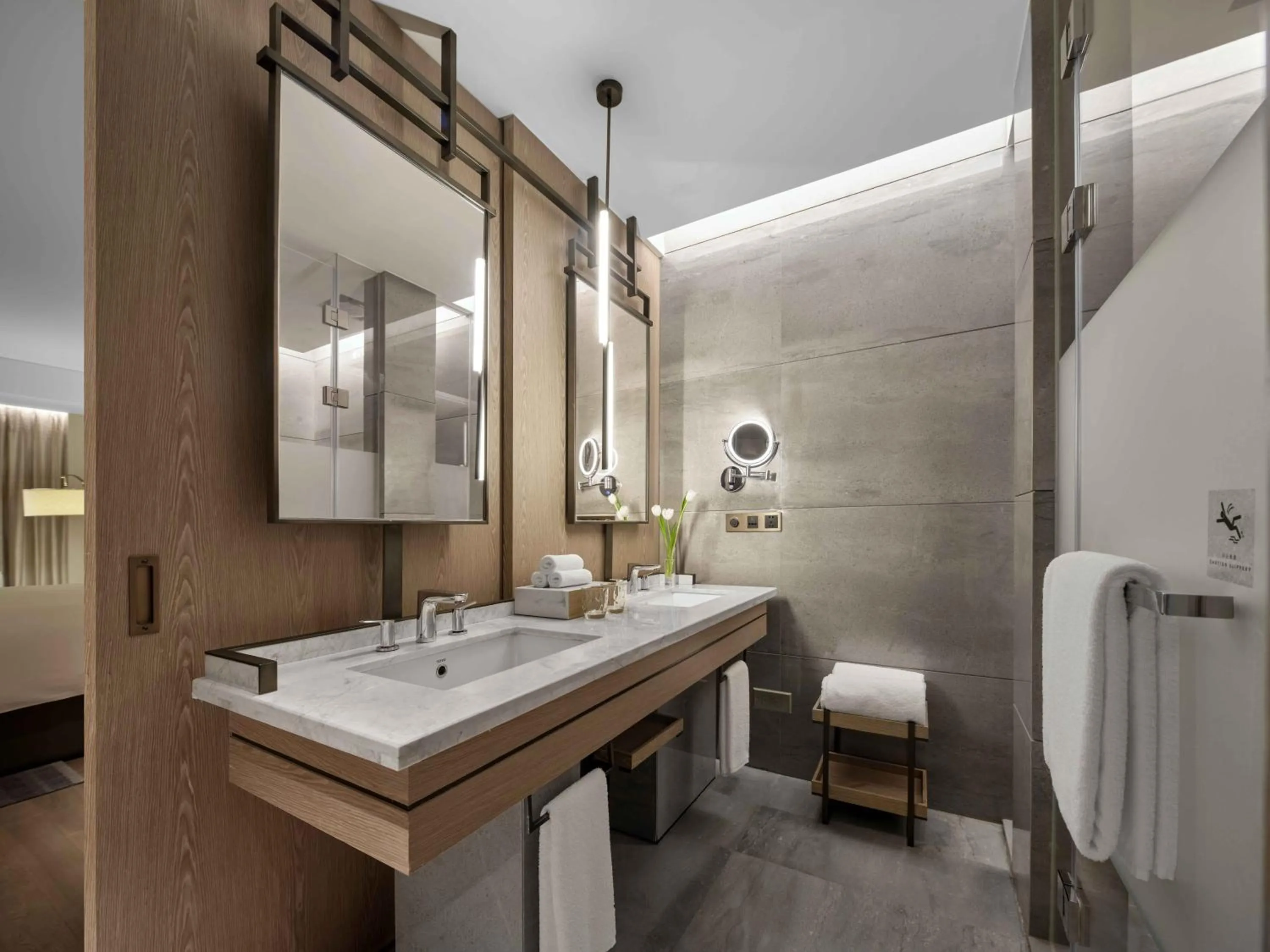 Bathroom in Vignette Collection Hangzhou Huaxia Center Hotel by IHG