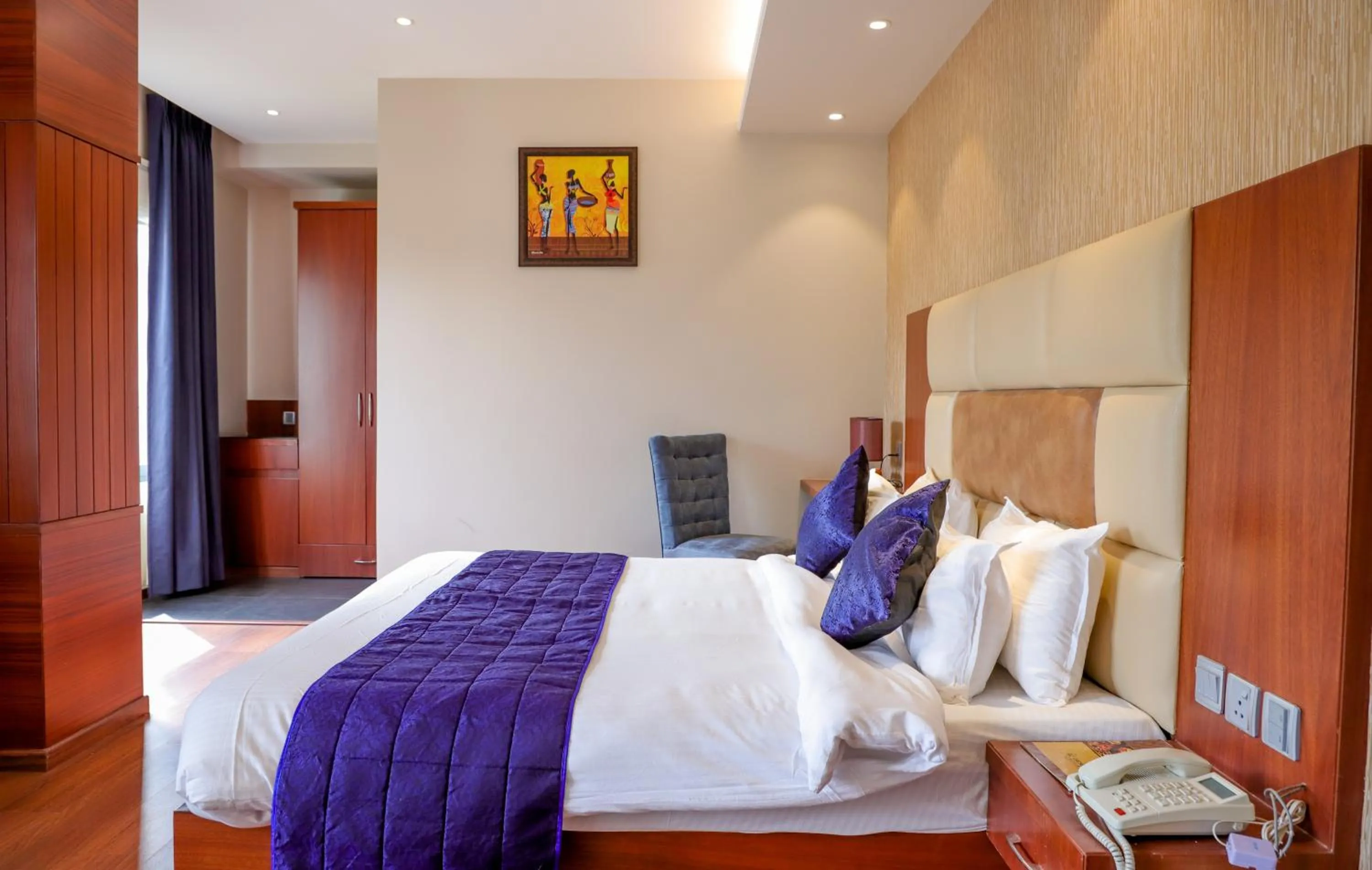 Bed in juSTa Palampur Resort & Convention Centre