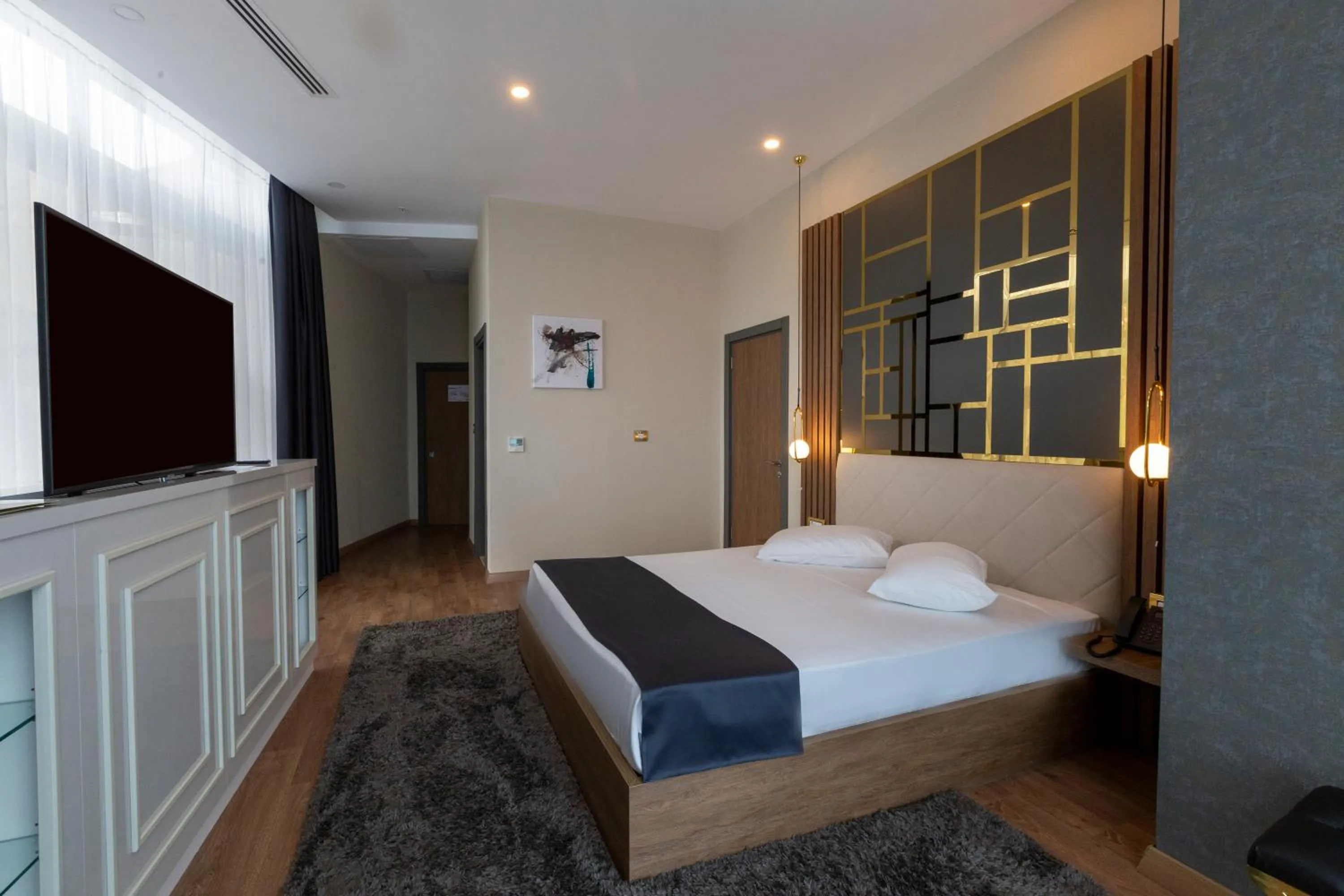 Communal lounge/ TV room, Bed in Cabir Deluxe Hotel Sapanca