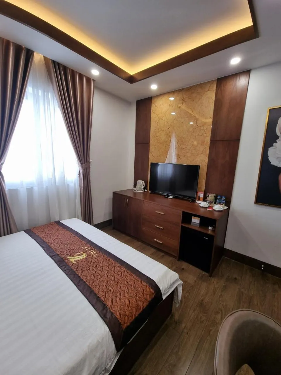 TV and multimedia, Bed in Hotel Trí Lê