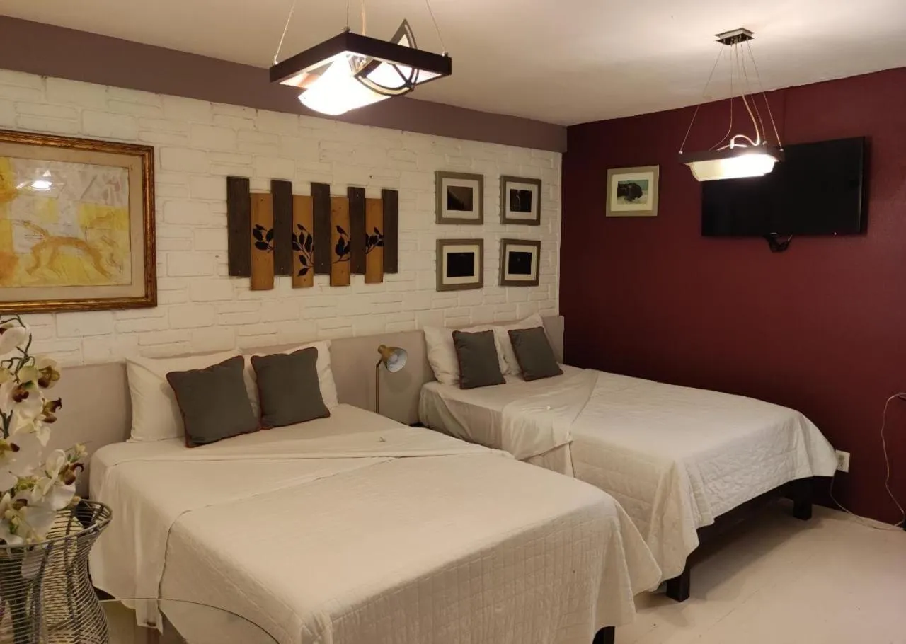 Bed in Suites Viveros de Coyoacán, estilo y comfort