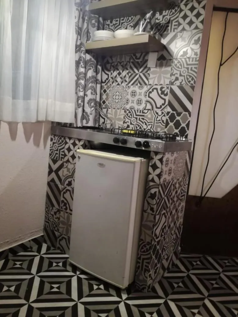 Kitchen or kitchenette in Suites Viveros de Coyoacán, estilo y comfort