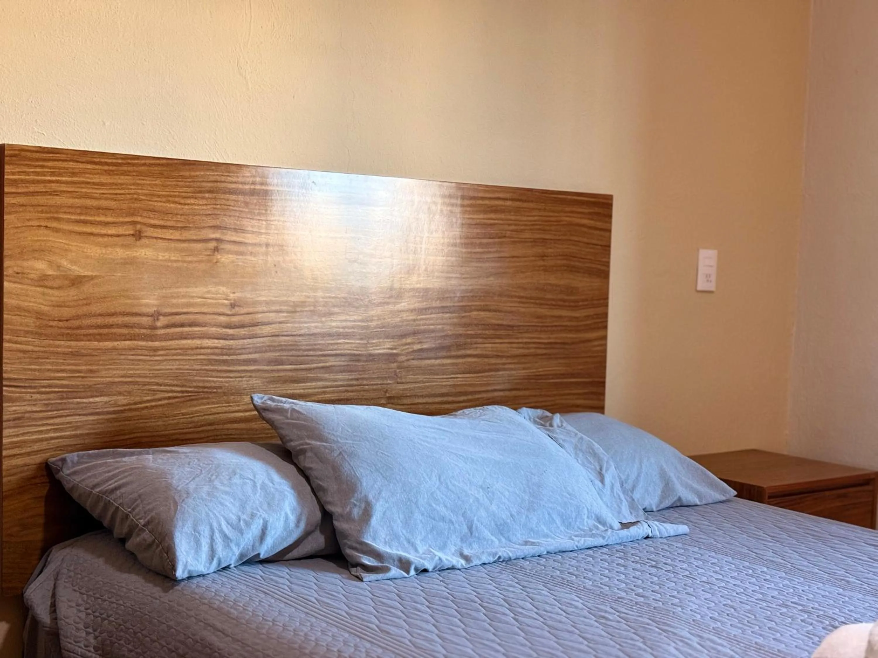 Bed in Villa La Palma Hotel