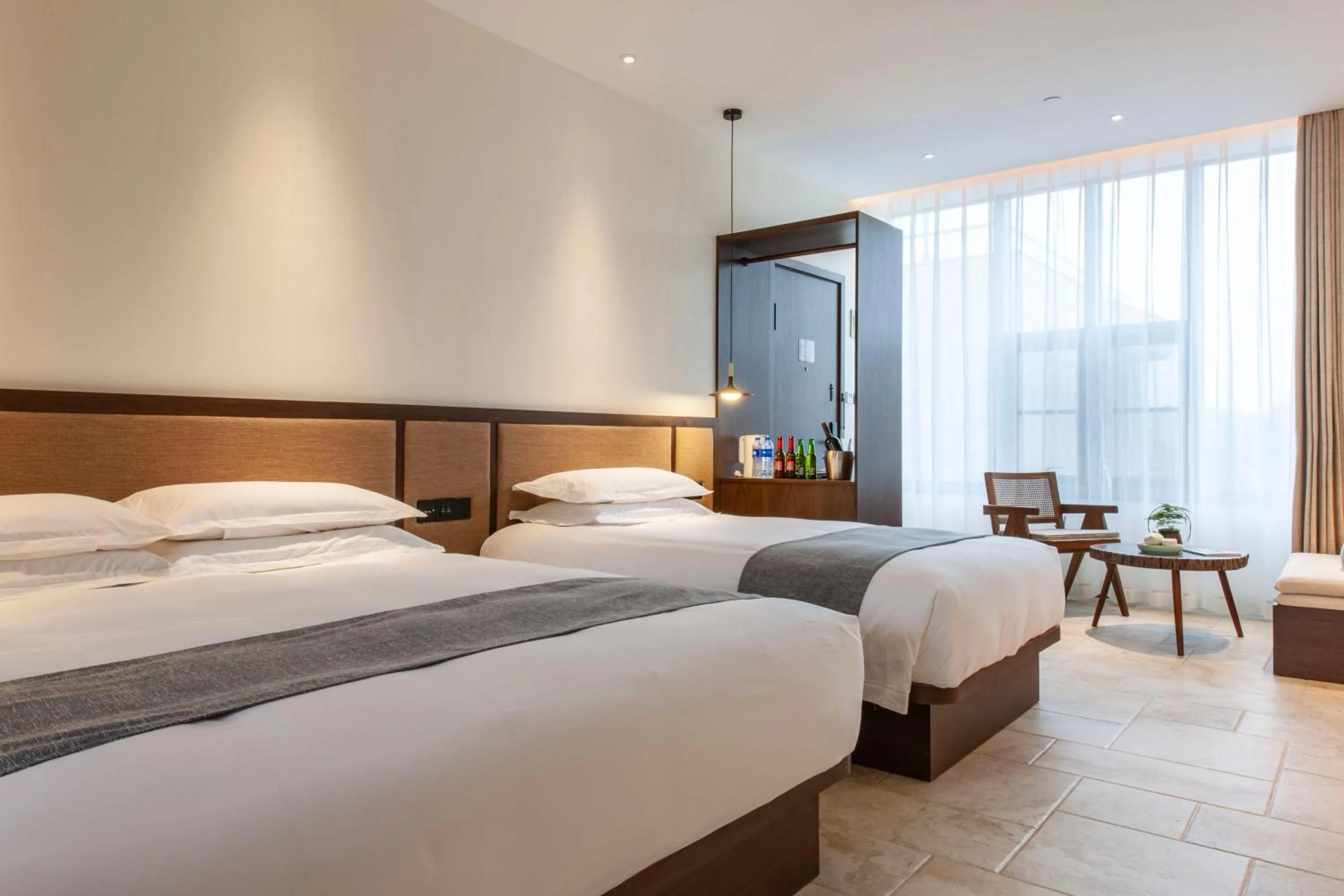 Bed in SSAW Boutique Hotel Hangzhou Liangyun