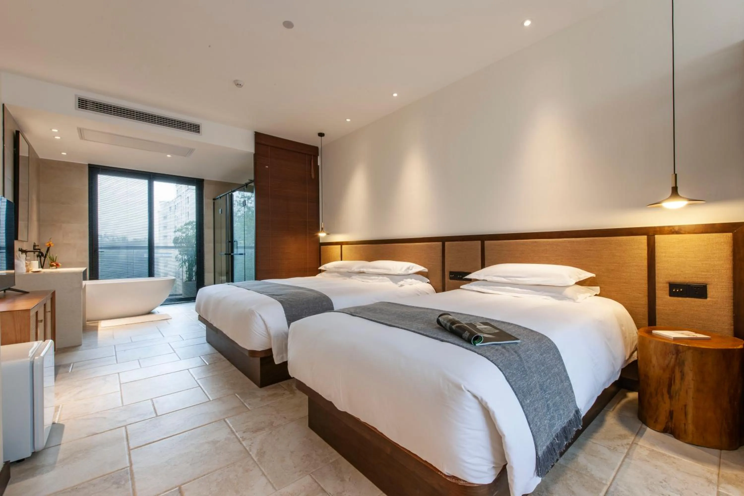Bed in SSAW Boutique Hotel Hangzhou Liangyun