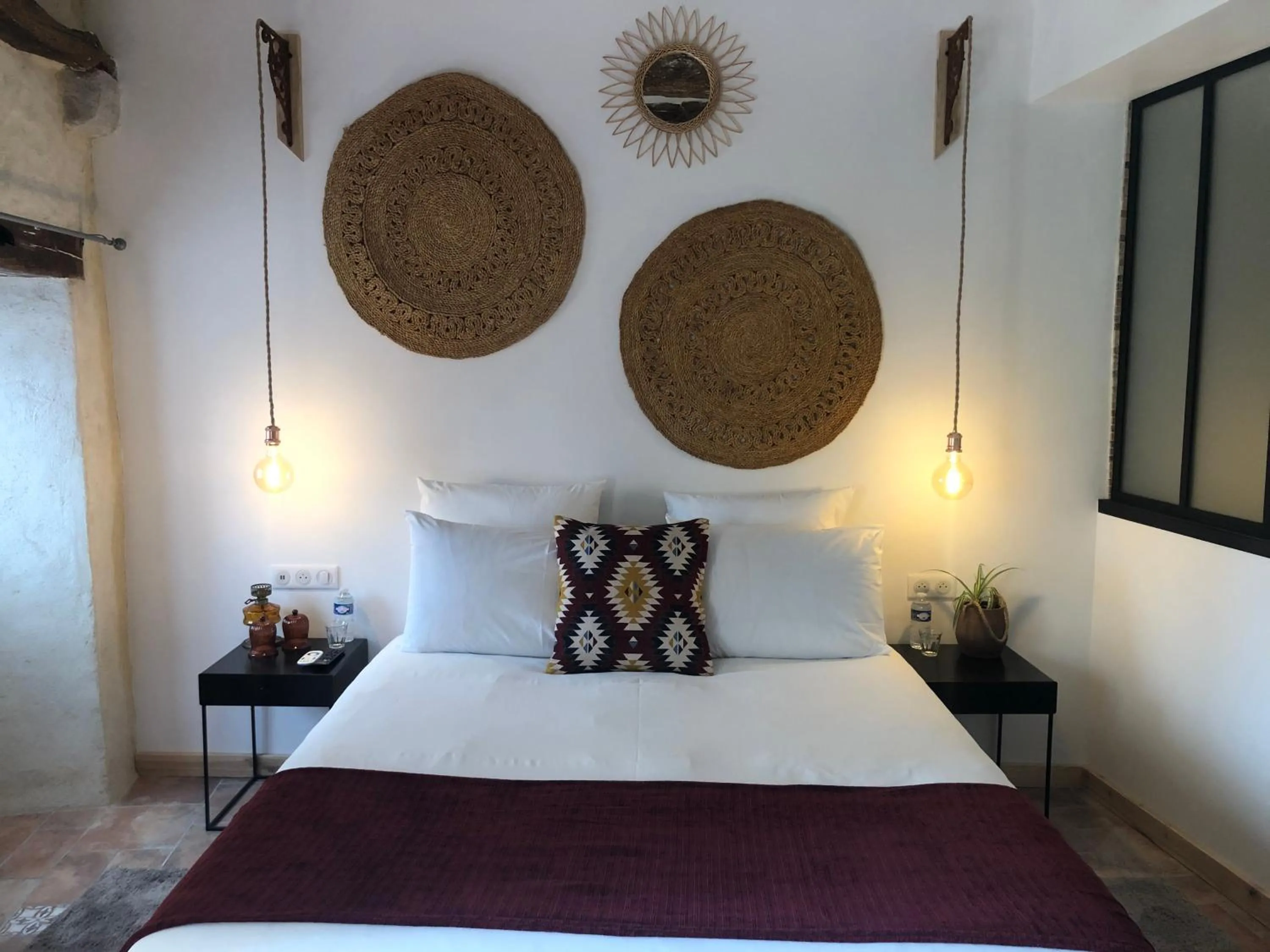 Bed in Maison Lapopie chambres et gîte