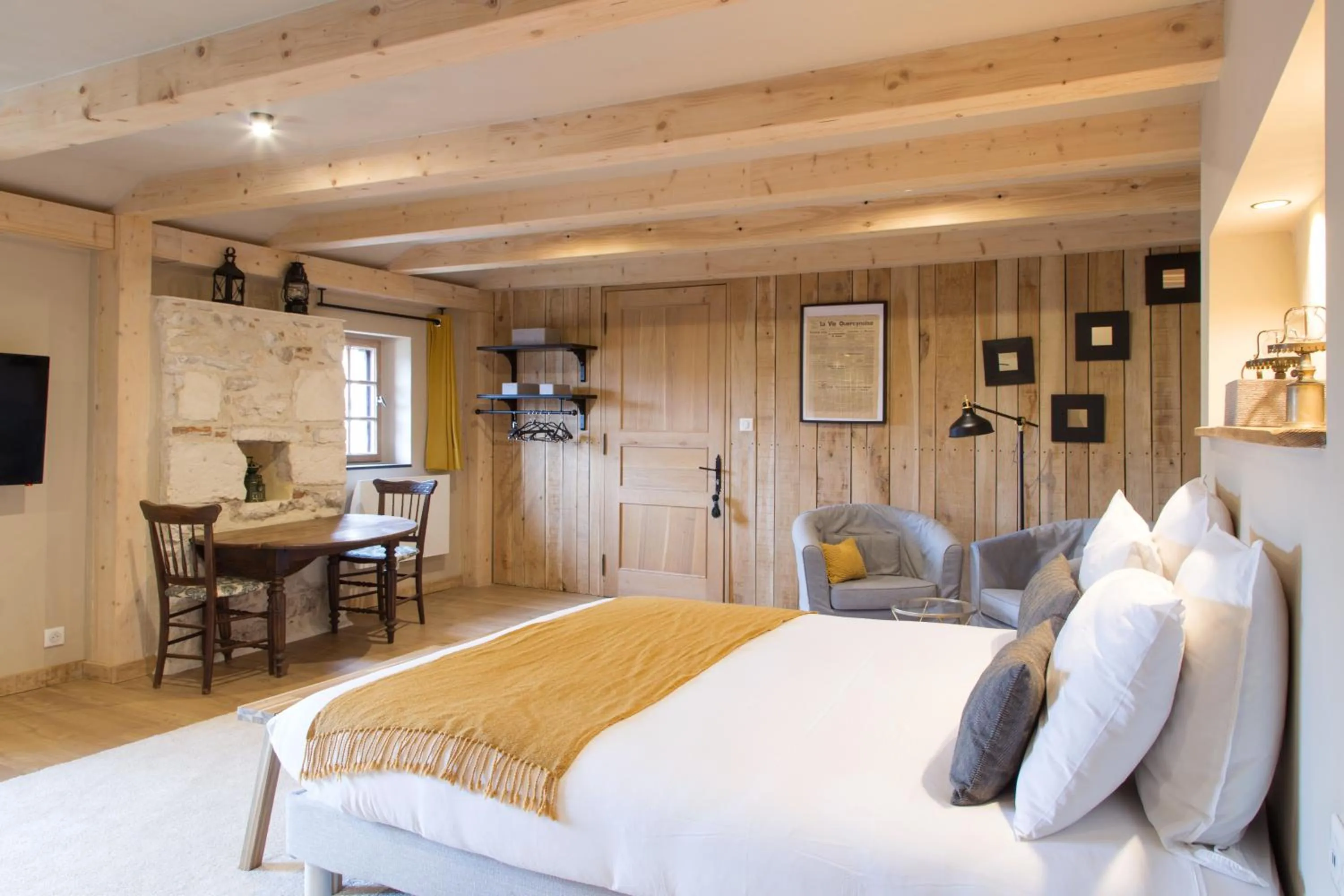 Bed in Maison Lapopie chambres et gîte