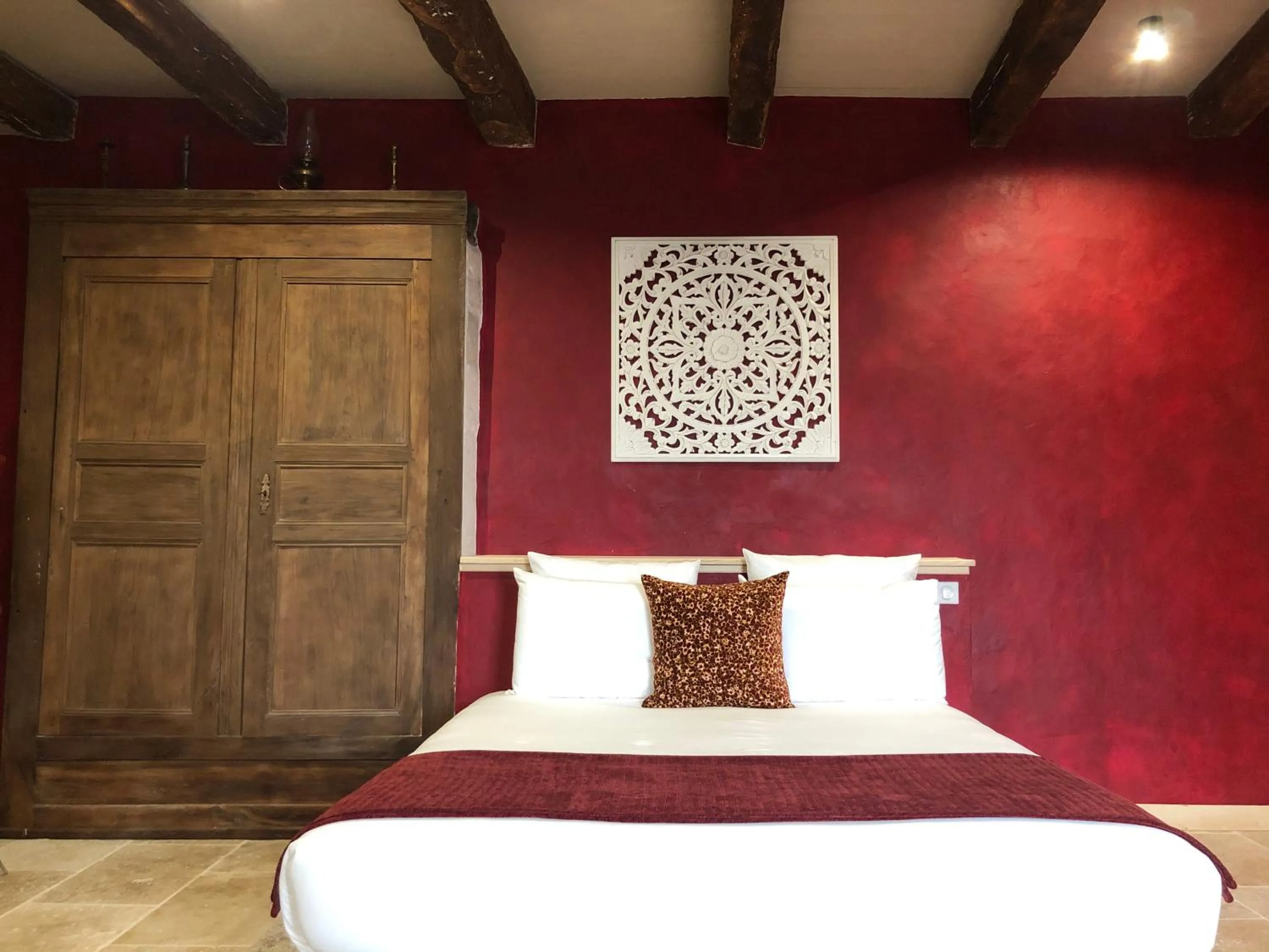 Bed in Maison Lapopie chambres et gîte