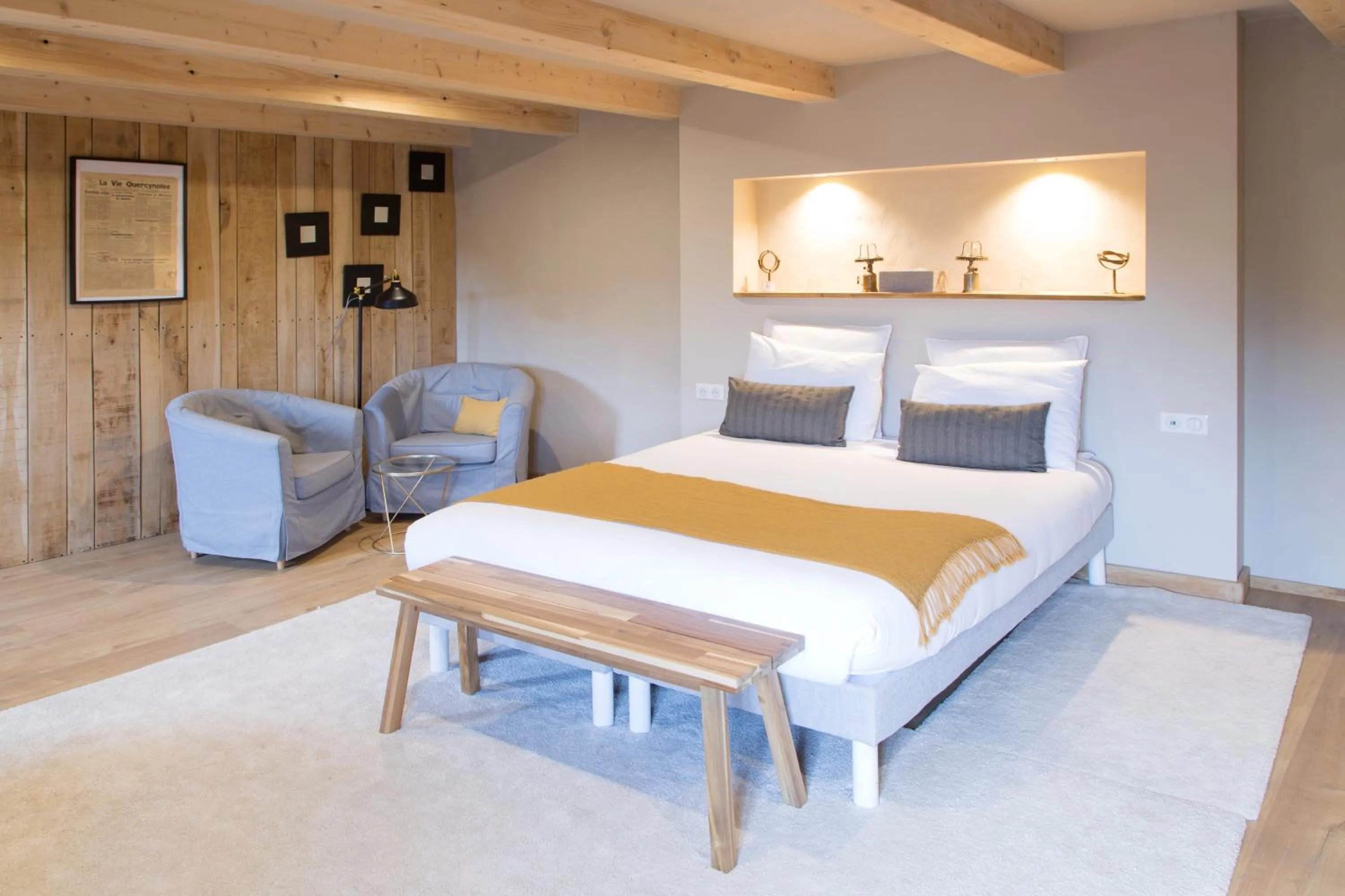 Bed in Maison Lapopie chambres et gîte