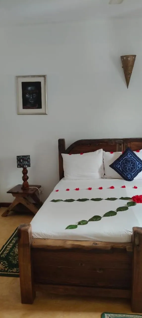 Bed in Kibanda Natural Kendwa Villa