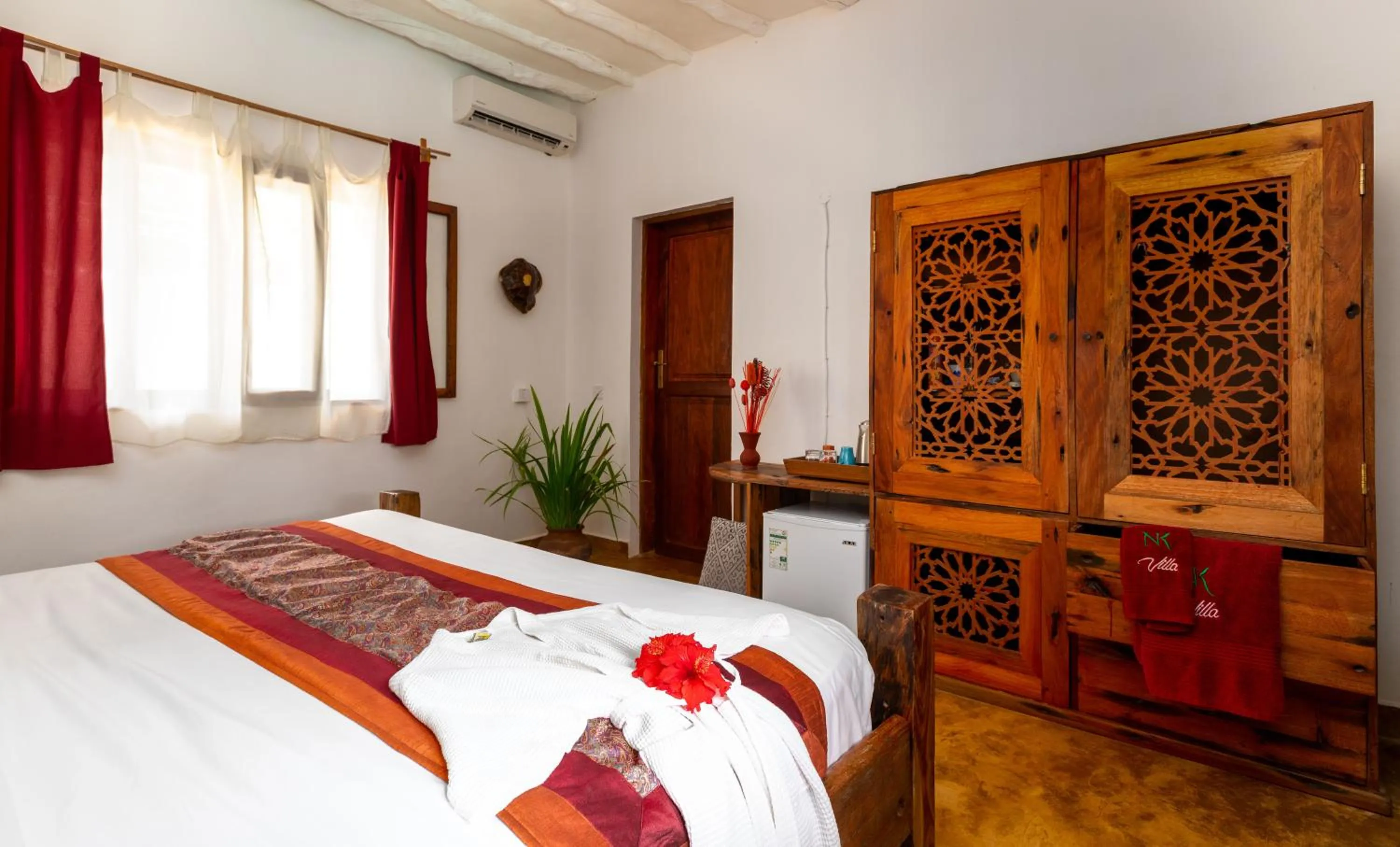 Photo of the whole room, Bed in Kibanda Natural Kendwa Villa